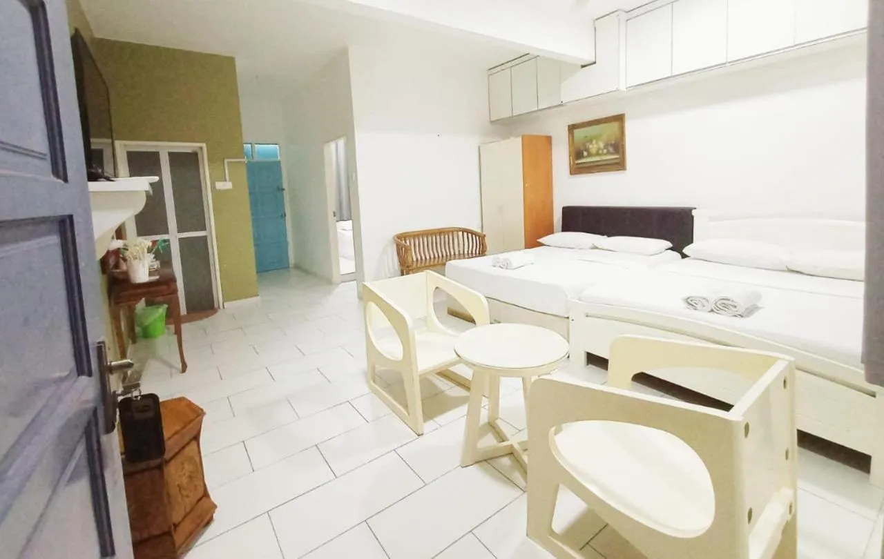 AQIL BEACH INN