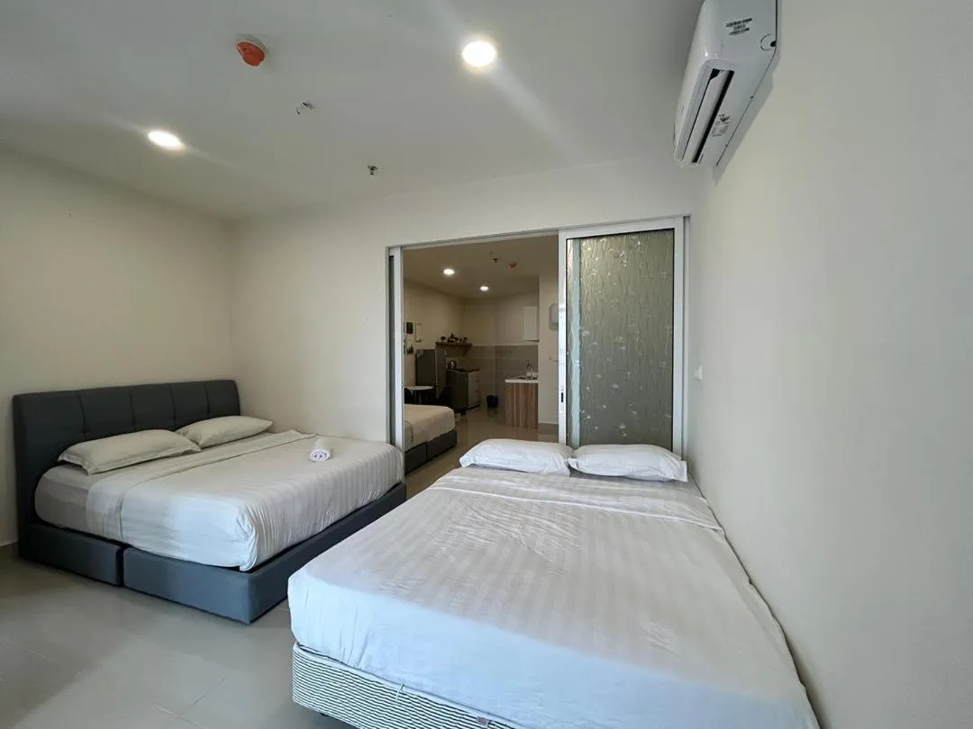 Bed in The Shore Kota Kinabalu City Centre by LW Suites