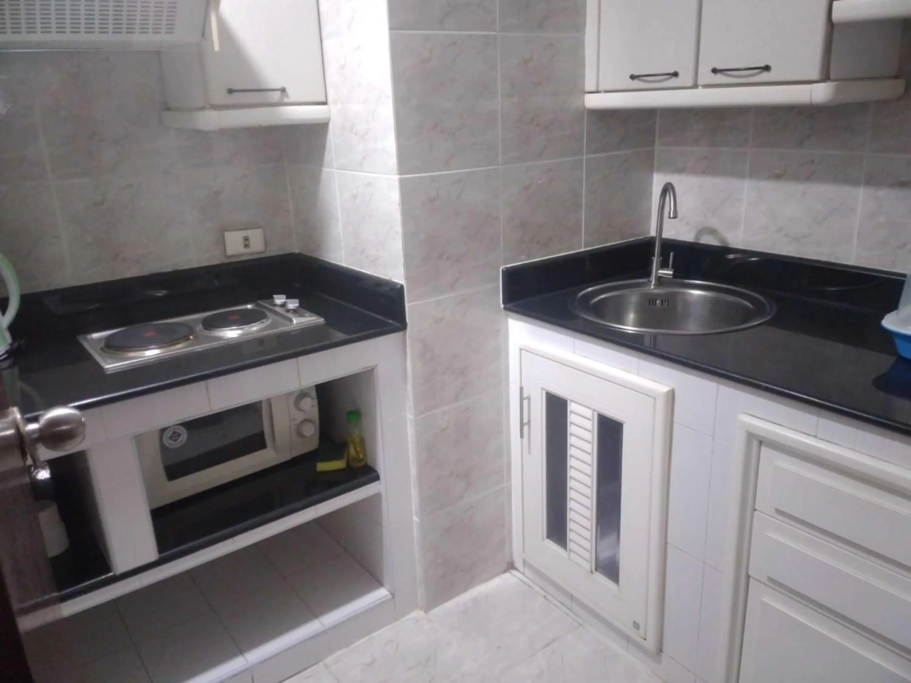 Kitchen or kitchenette in Omni Tower Cozy Apartments by Direct Rooms