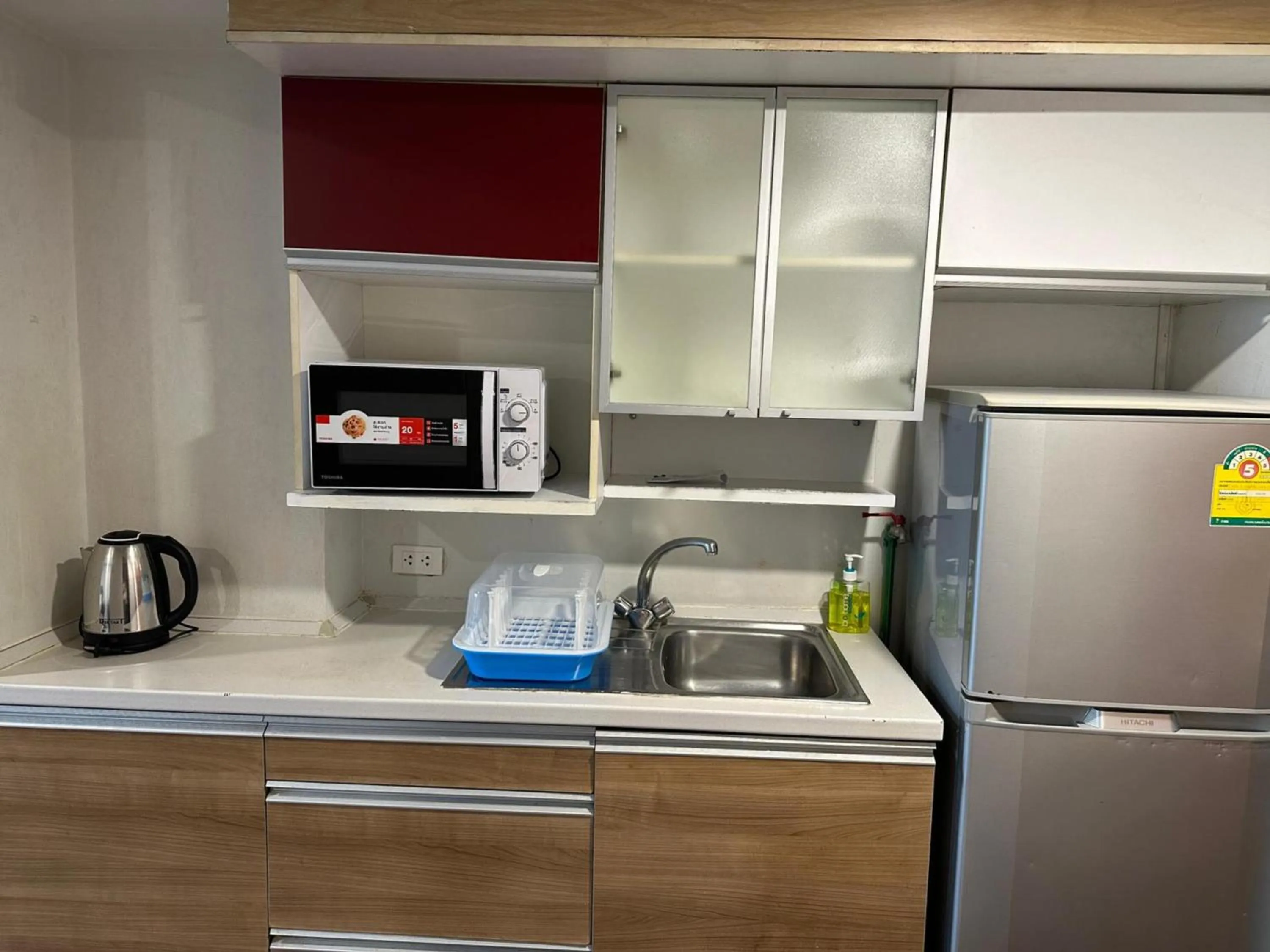 minibar in Omni Tower Cozy Apartments by Direct Rooms