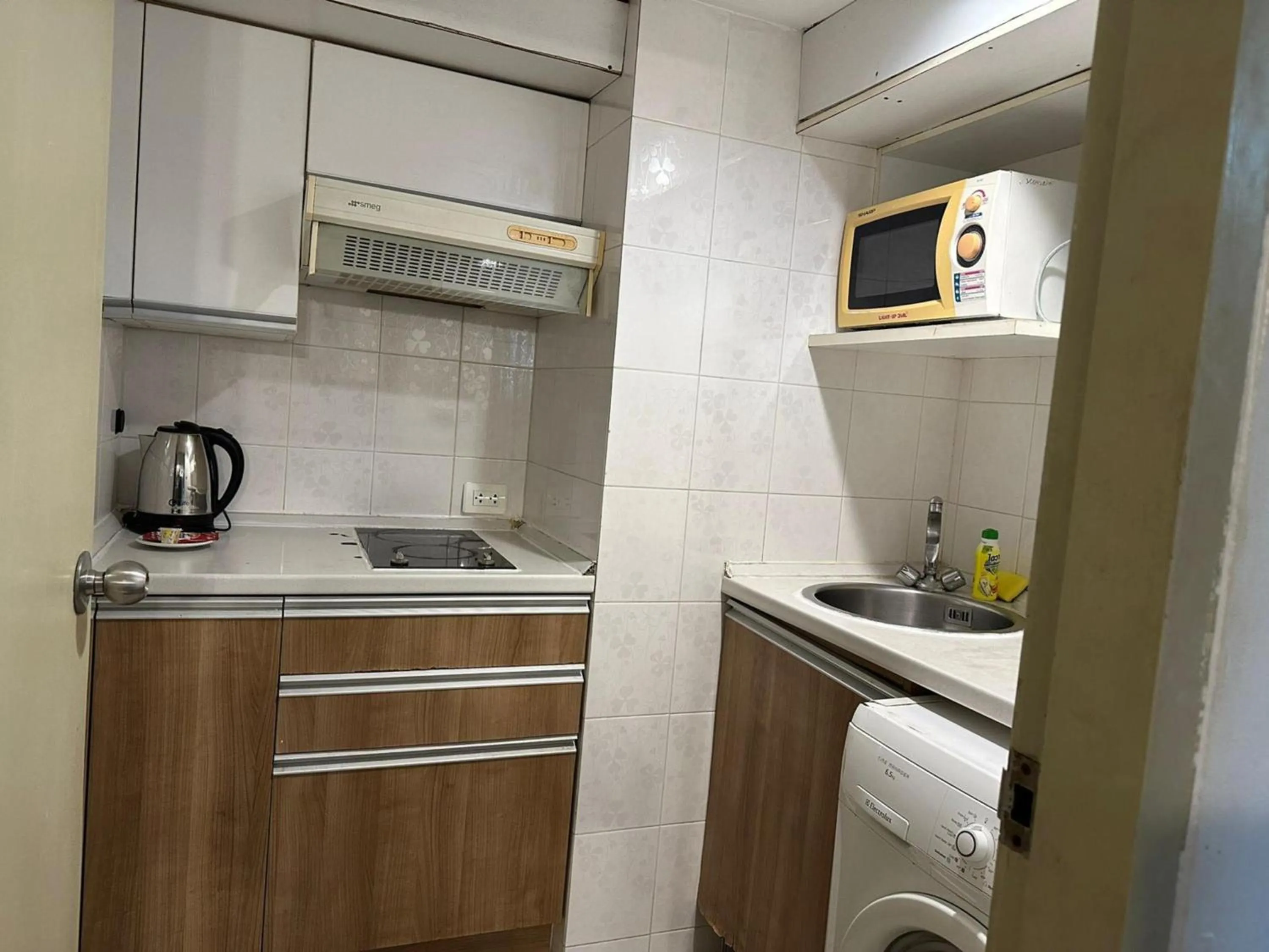 Kitchen or kitchenette in Omni Tower Cozy Apartments by Direct Rooms