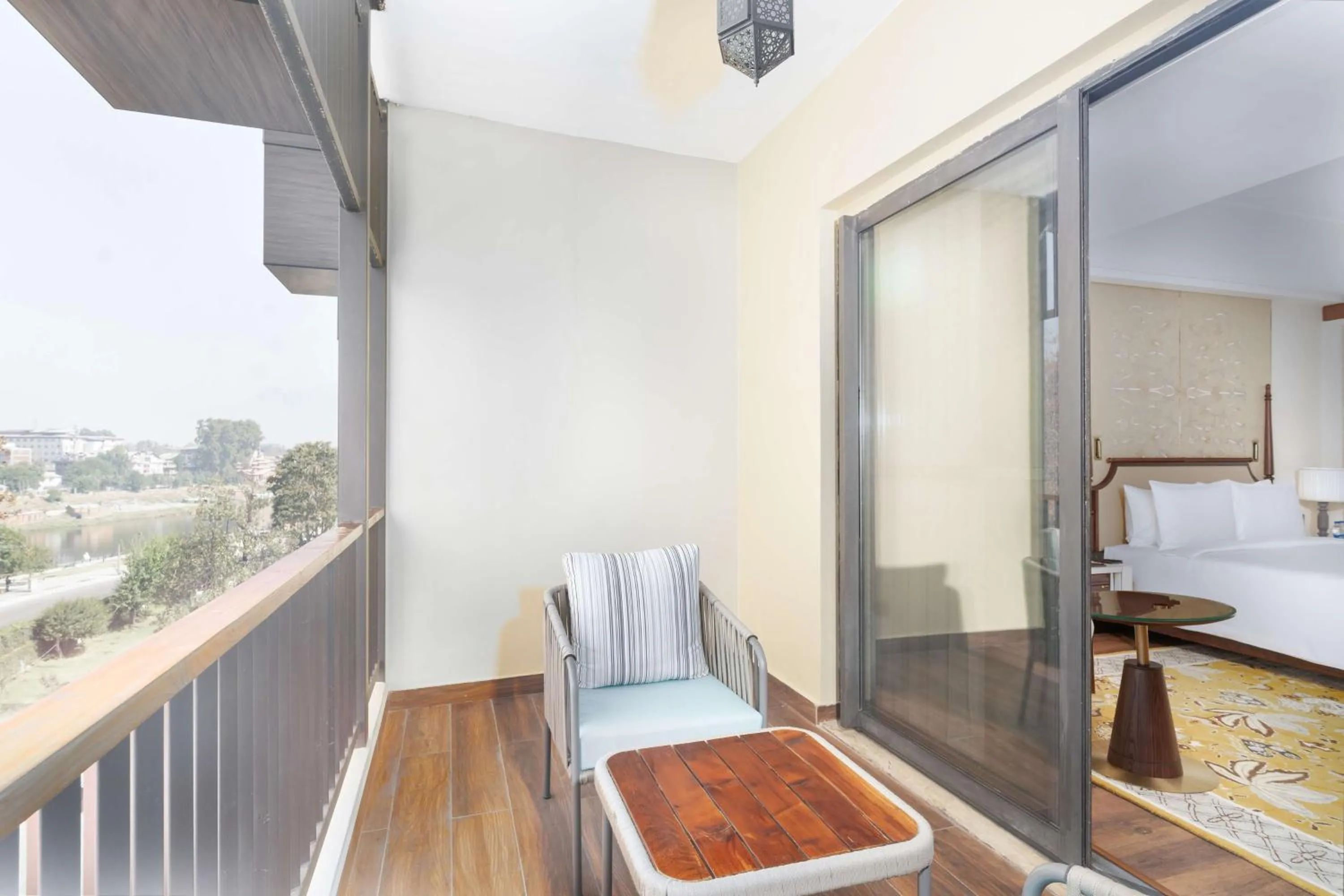 Balcony/Terrace, Bed in Radisson Collection Hotel & Spa, Riverfront Srinagar