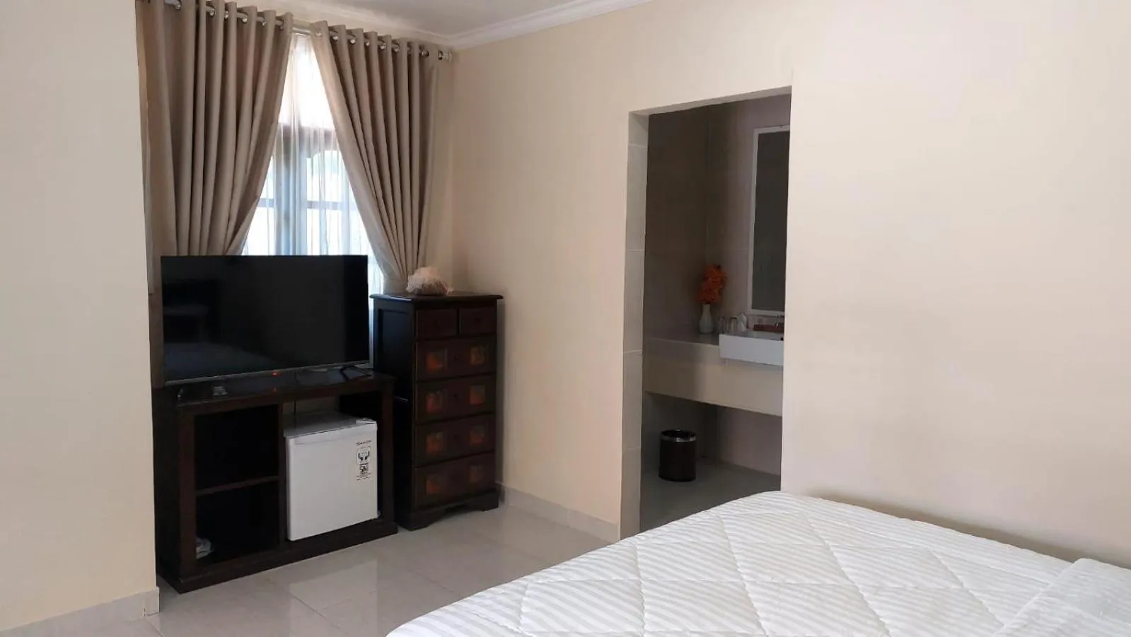 TV and multimedia, Bed in Grand Melka Hotel