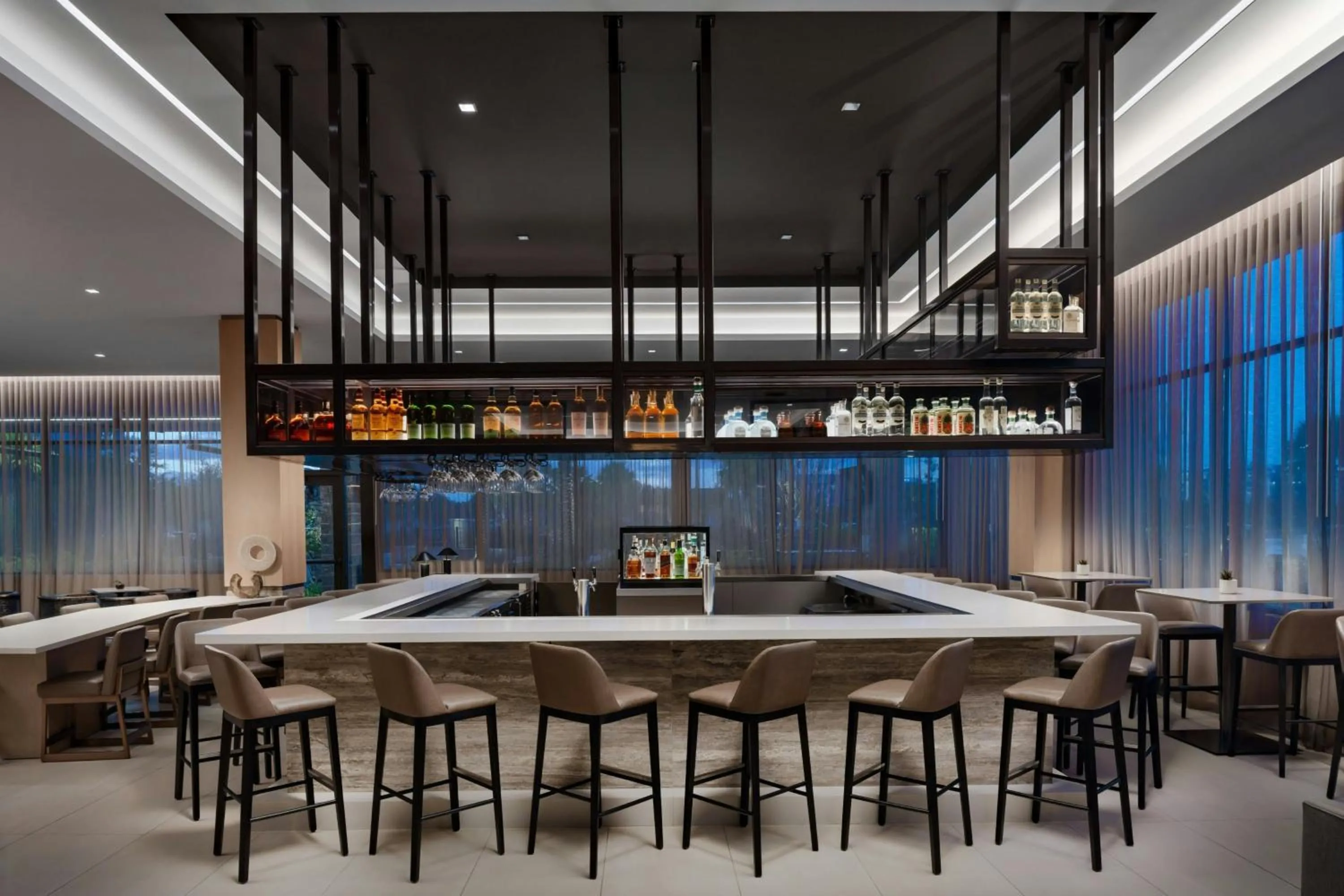 Lounge or bar in AC Hotel by Marriott Jacksonville St Johns Town Center