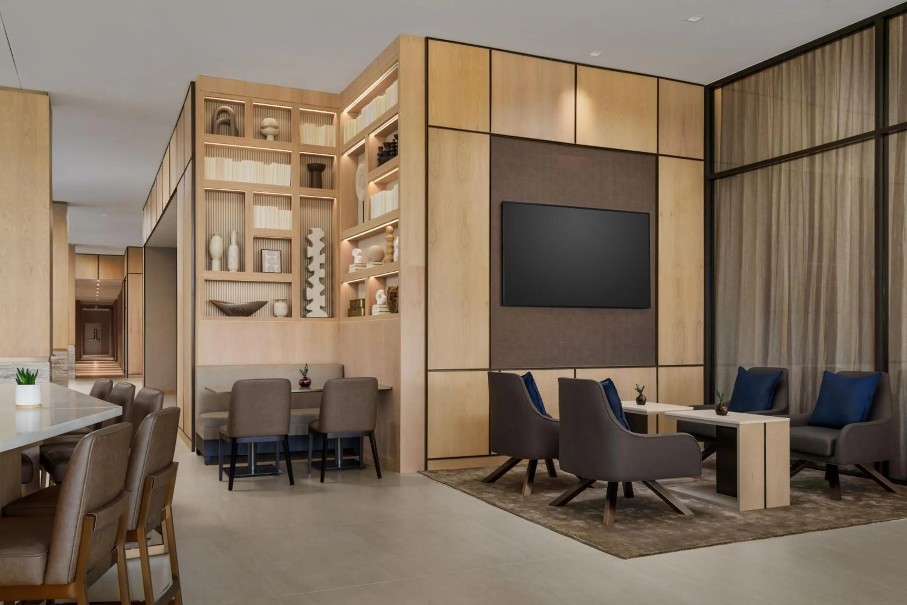 Lobby or reception in AC Hotel by Marriott Jacksonville St Johns Town Center