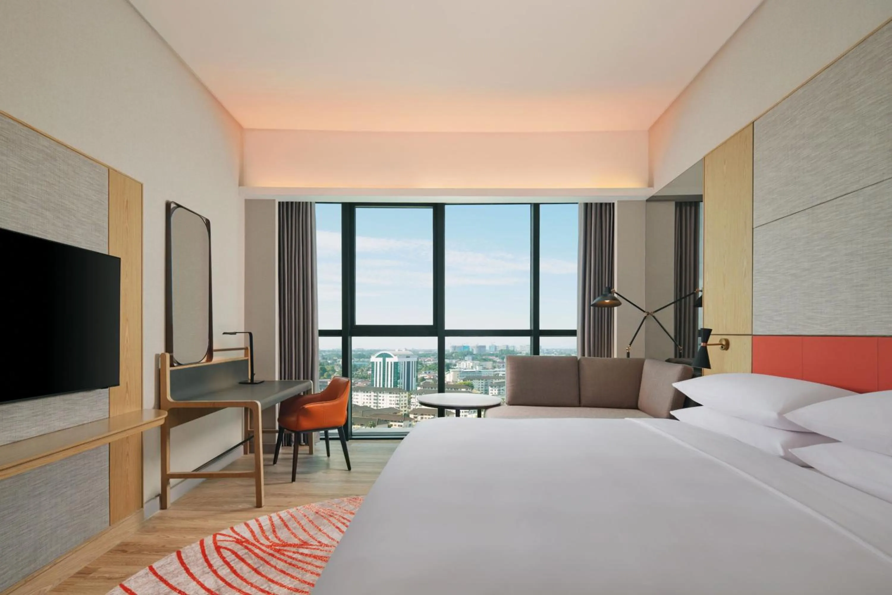 Photo of the whole room, Bed in Sheraton Kuching Hotel