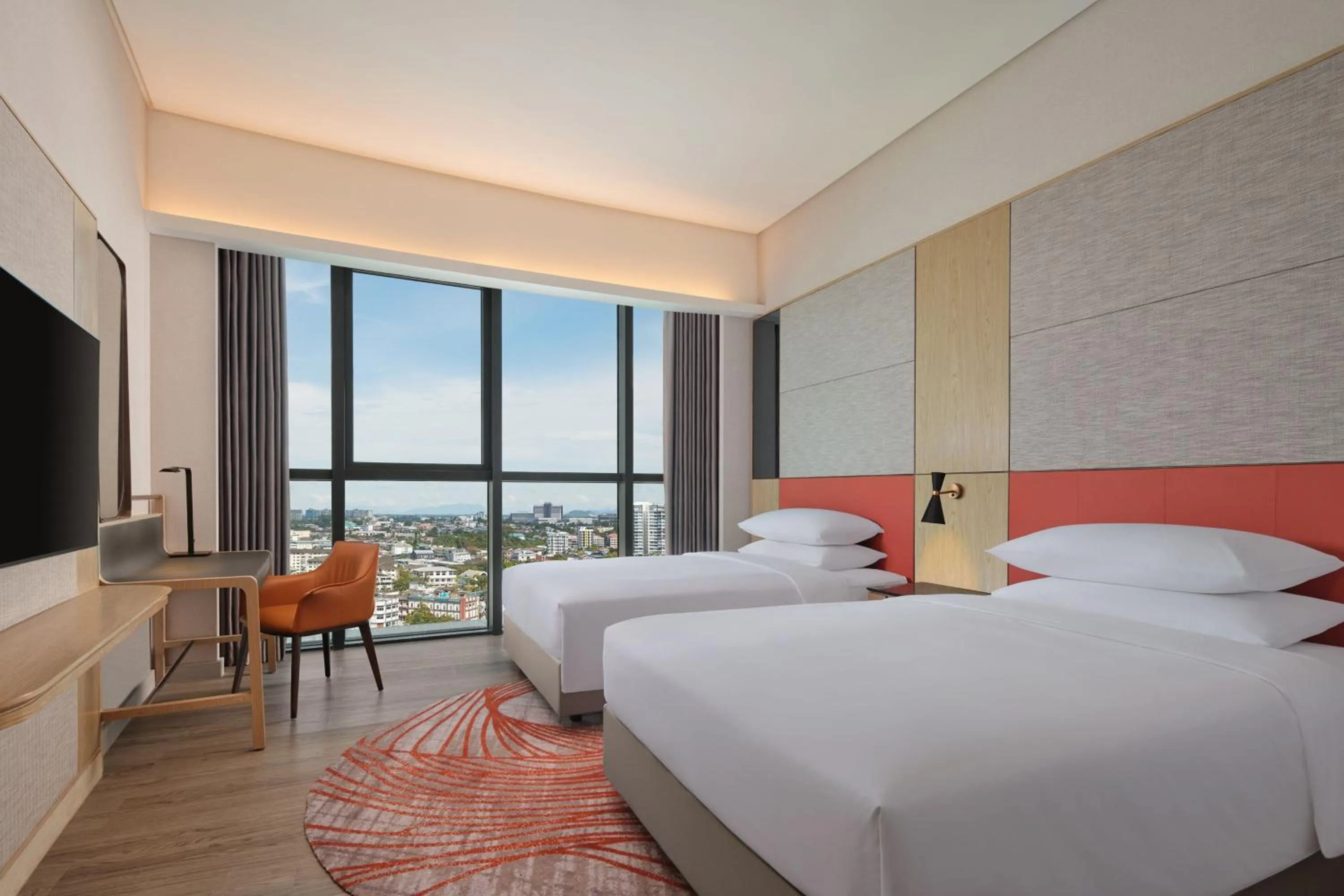 Photo of the whole room, Bed in Sheraton Kuching Hotel