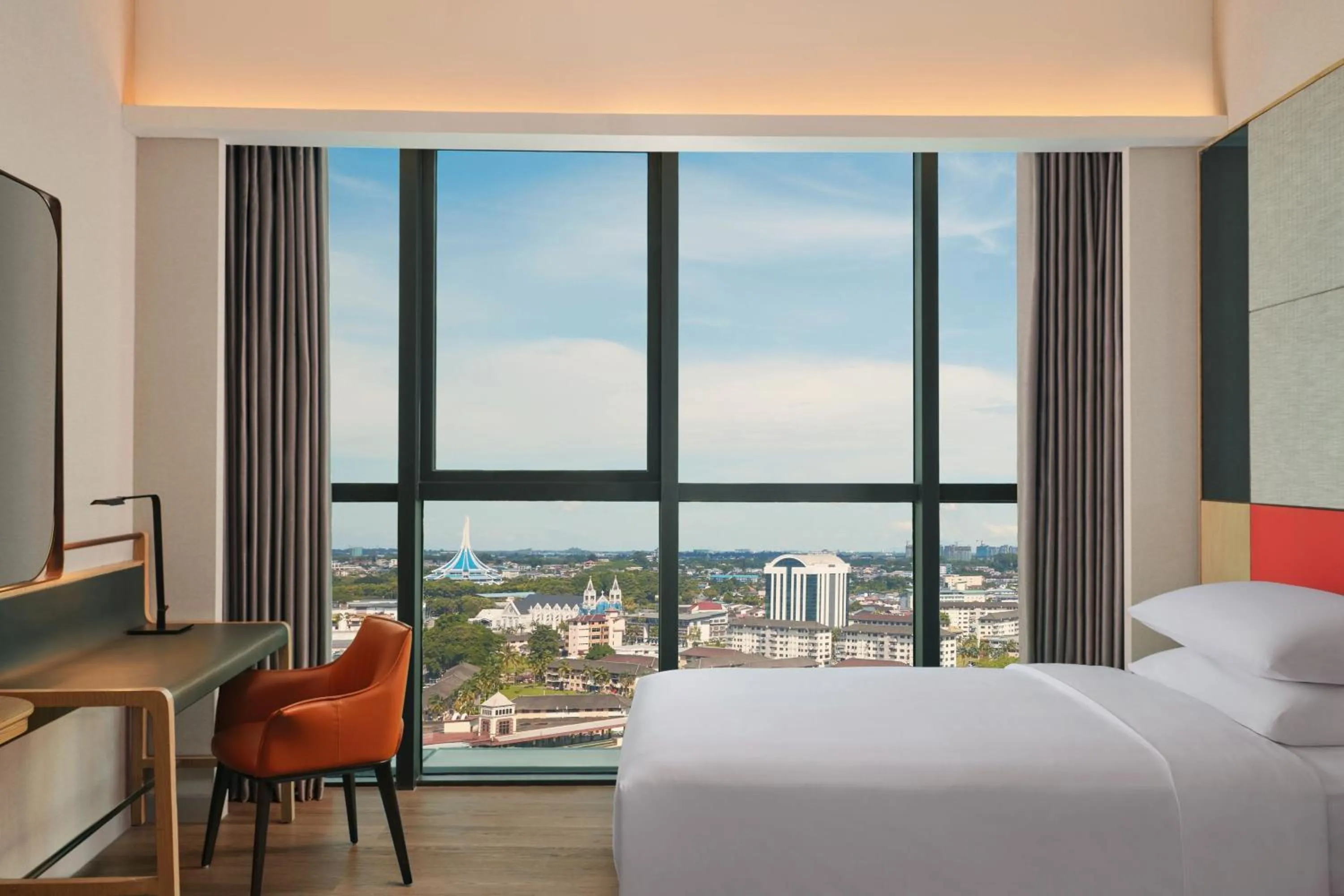 Photo of the whole room, Bed in Sheraton Kuching Hotel