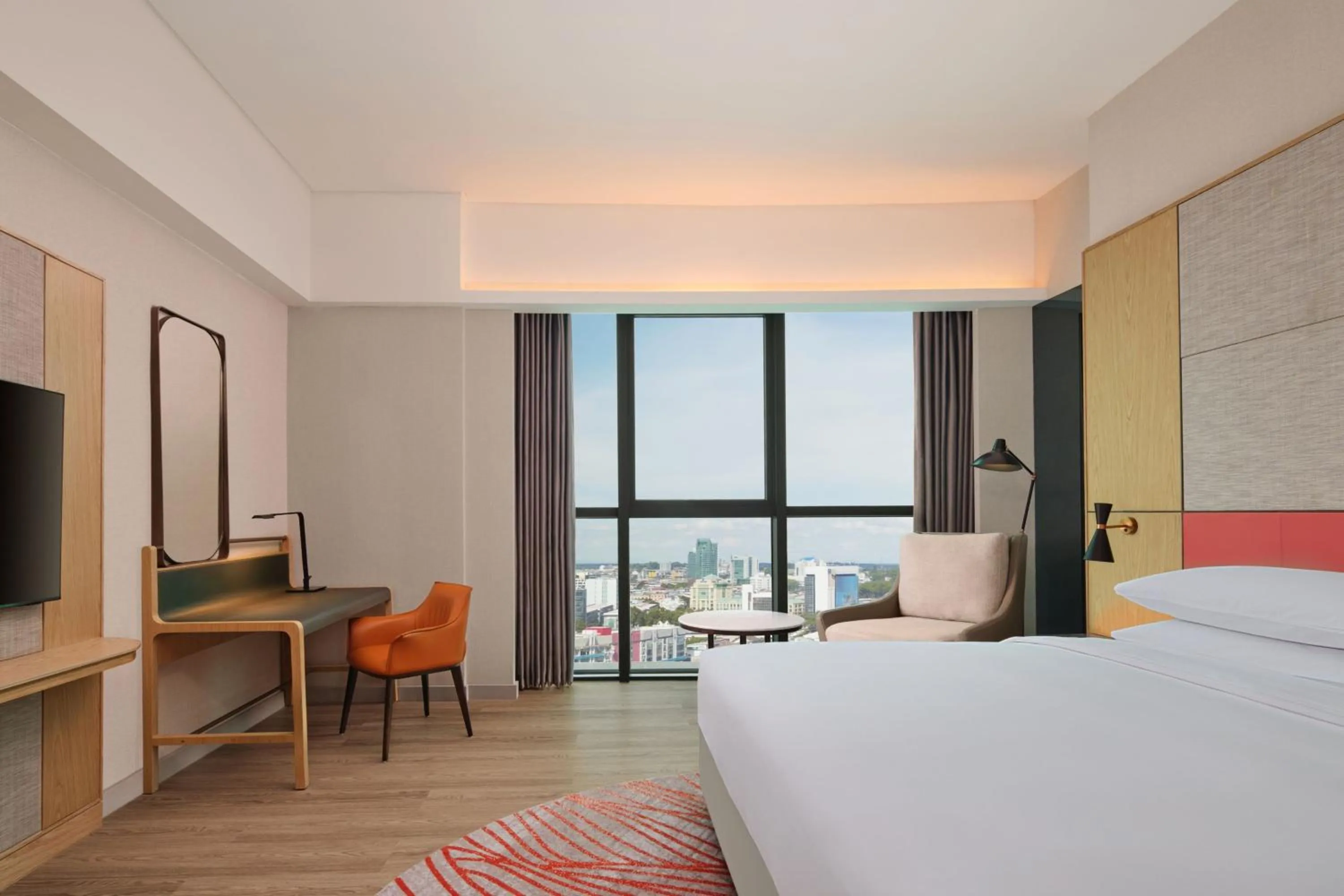 Photo of the whole room, Bed in Sheraton Kuching Hotel