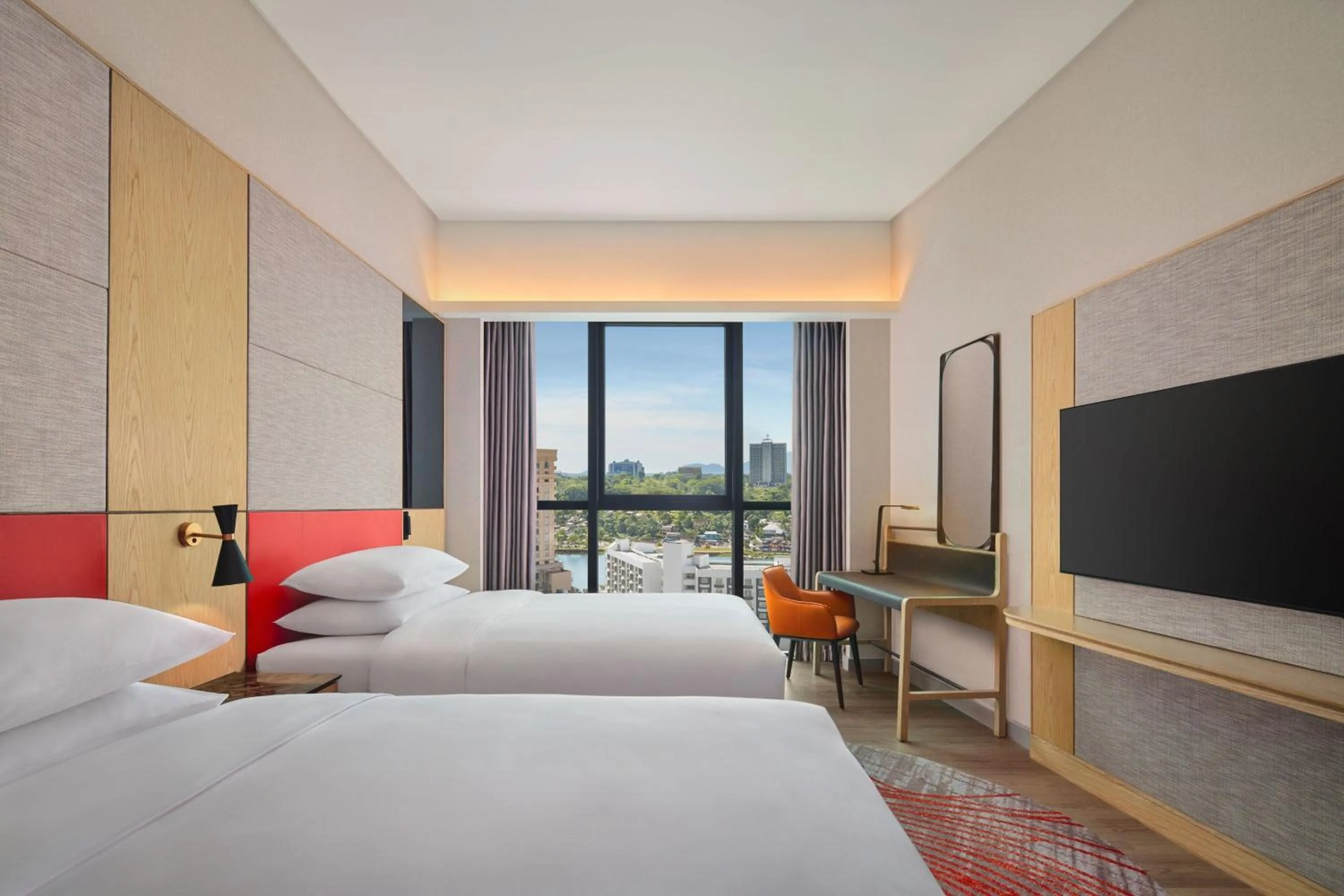 Photo of the whole room, Bed in Sheraton Kuching Hotel