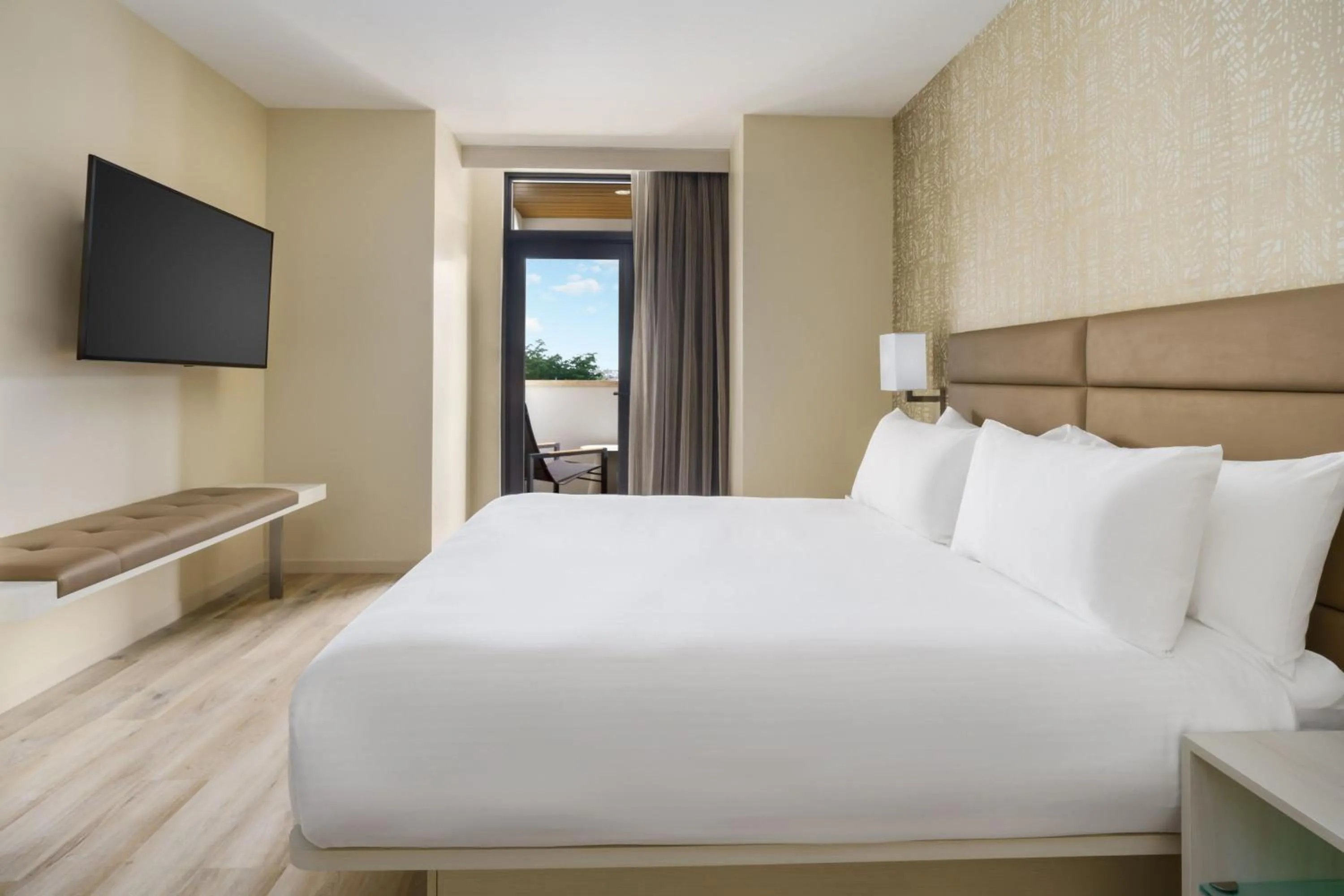 Photo of the whole room, Bed in AC Hotel by Marriott Naples 5th Avenue