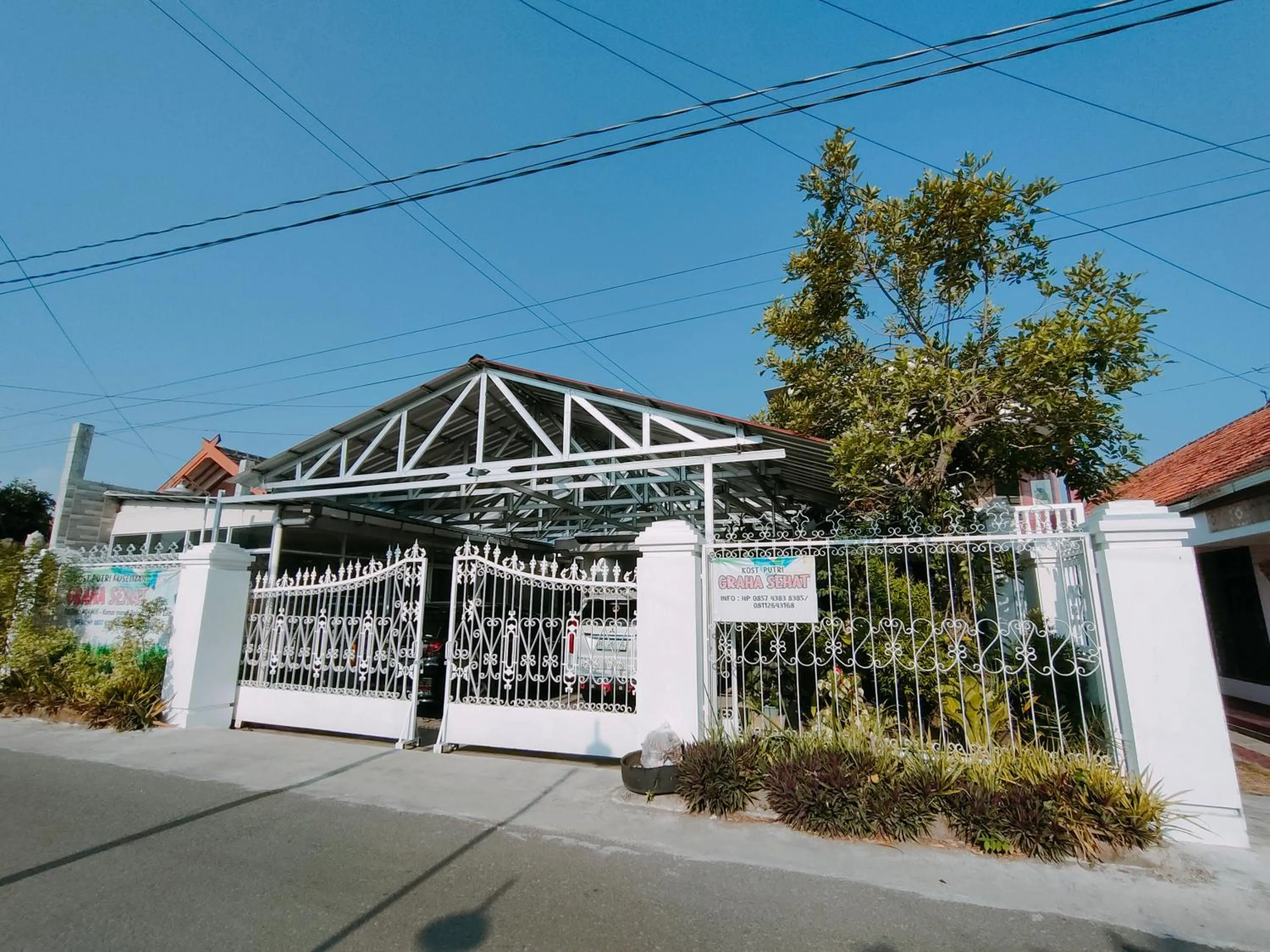 Facade/entrance in RedDoorz Syariah near Jogja Expo Center