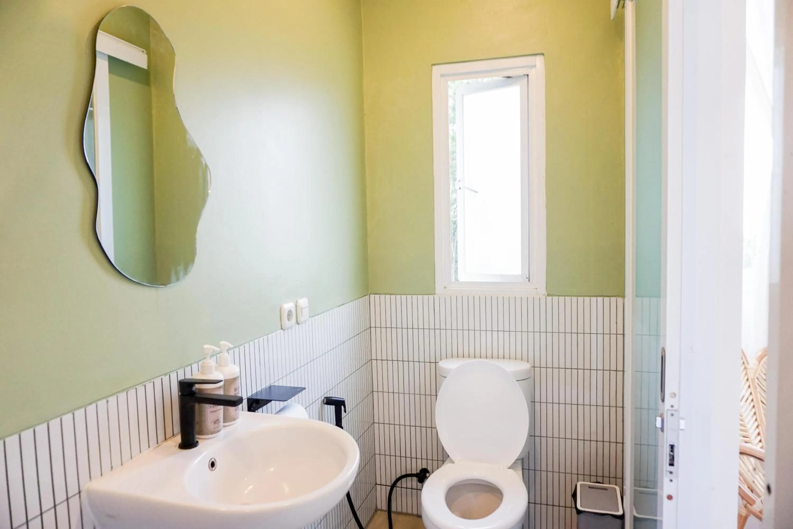 Toilet in Over Easy Apartment
