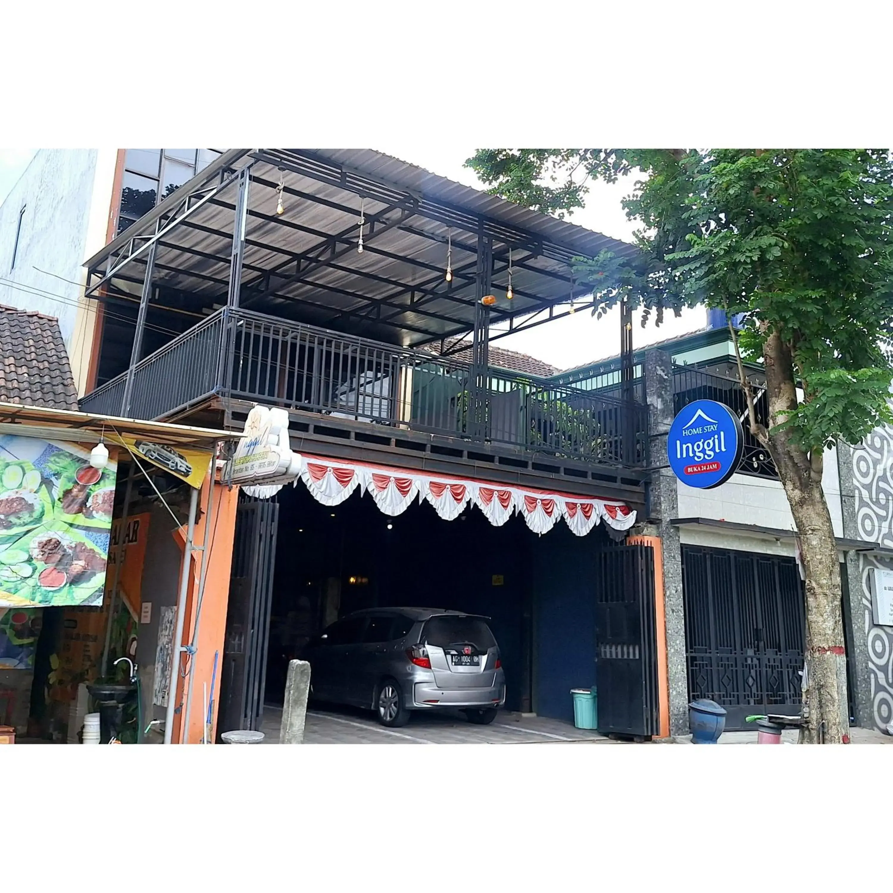 Facade/entrance in Home Inggil RedPartner Facade/entrance in Home Inggil RedPartner