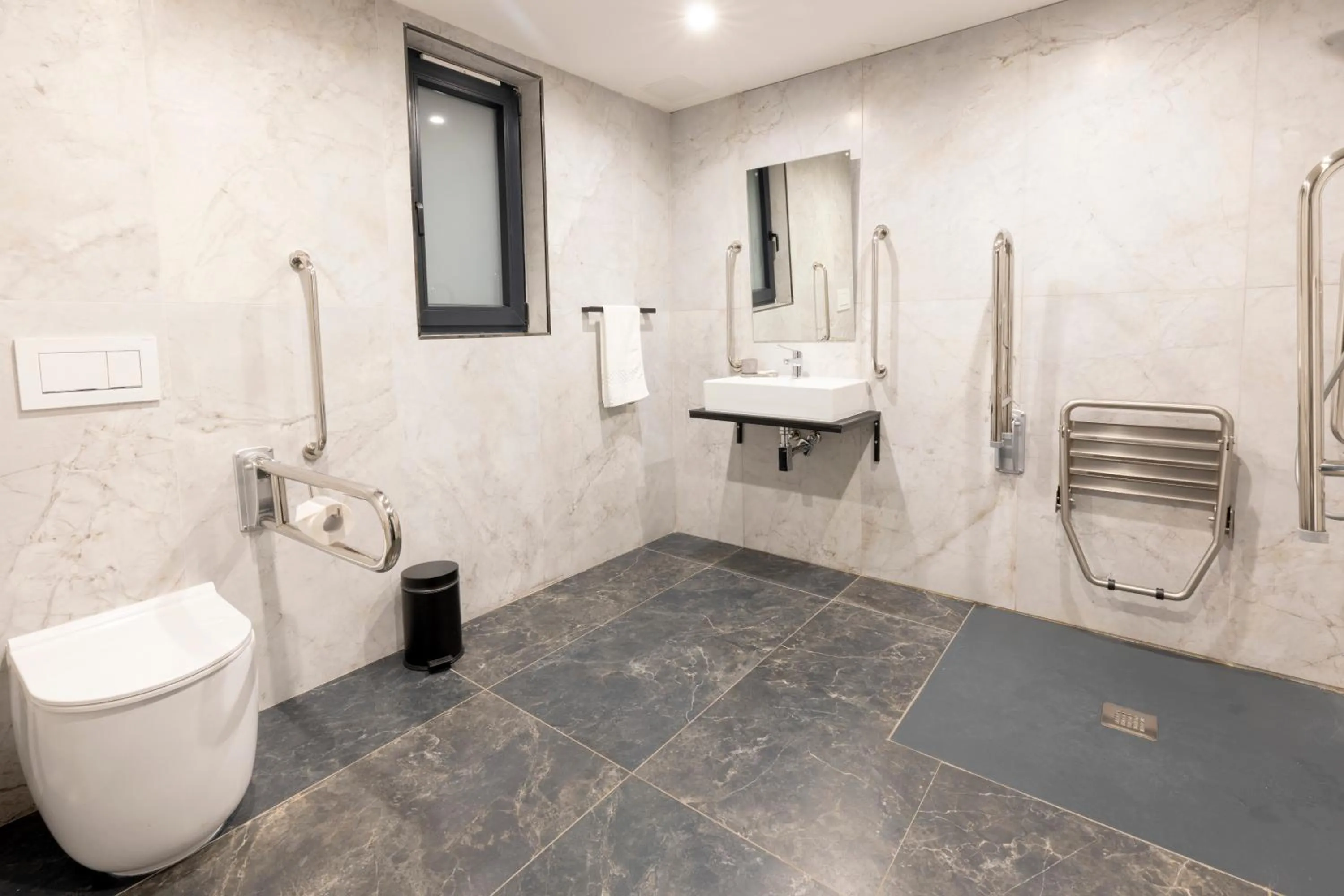 Bathroom in The Londoner Hotel St. Julian's