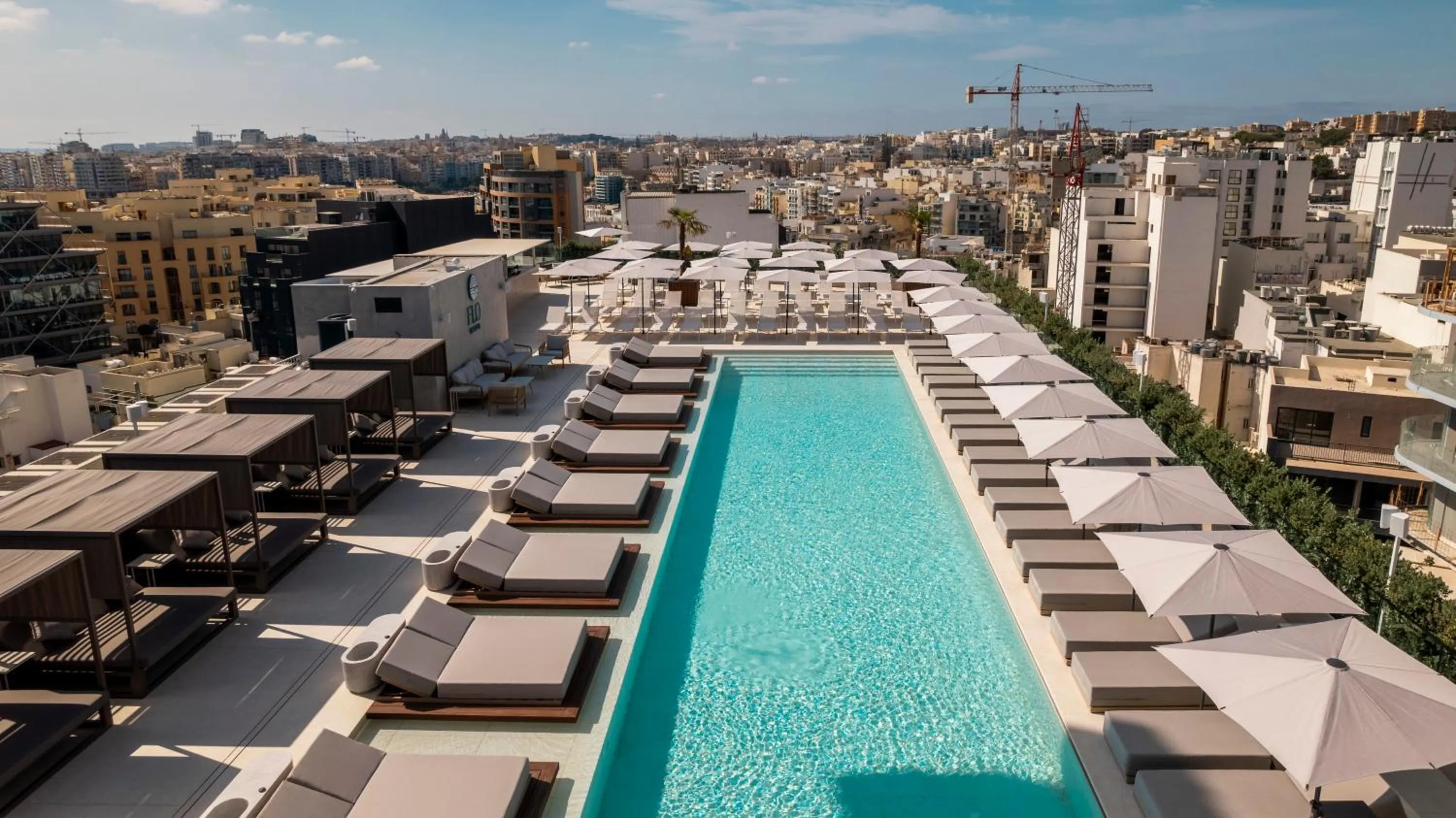 Swimming pool in The Londoner Hotel St. Julian's