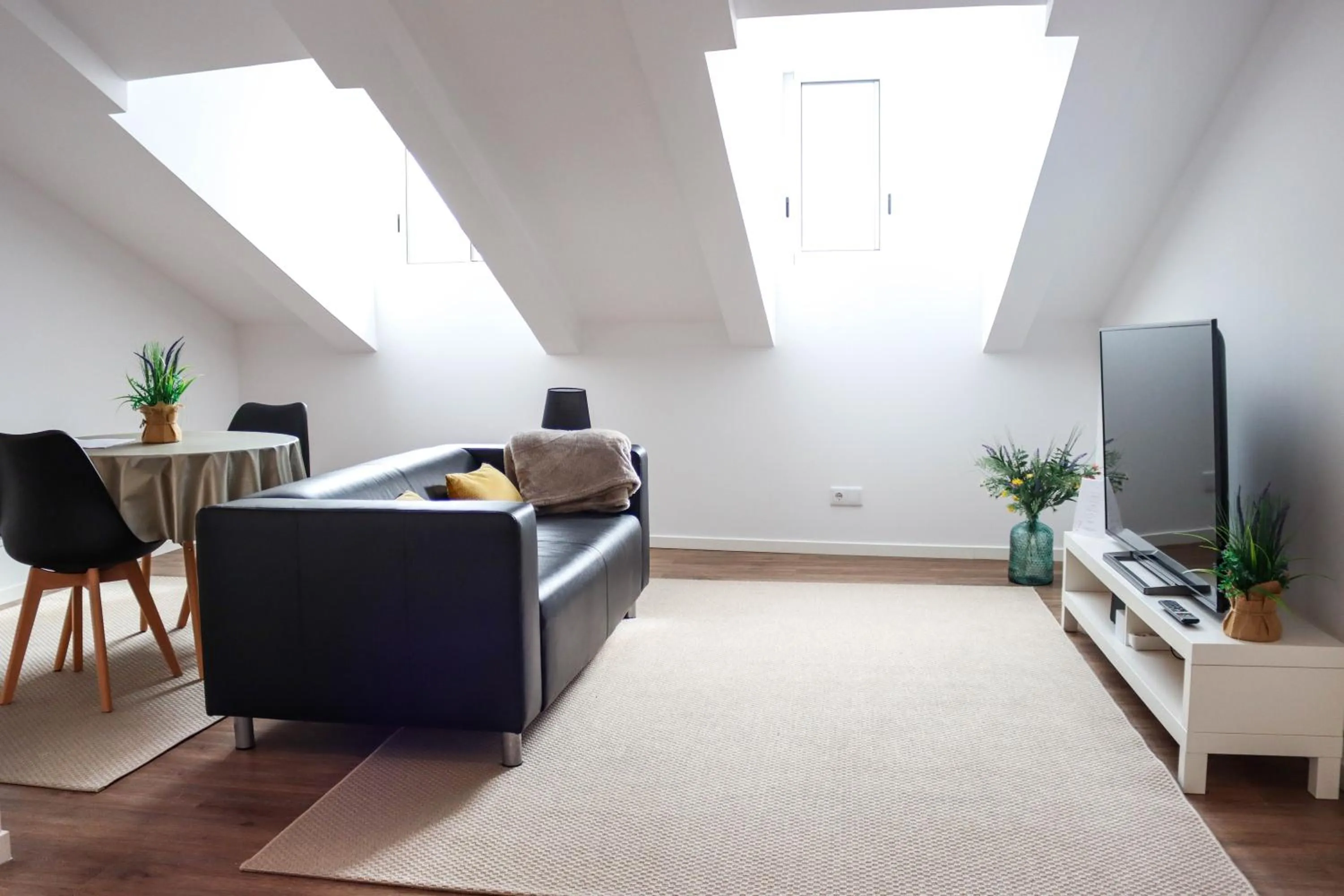 Communal lounge/ TV room in São Miguel Charming House "D" by LFC Apts