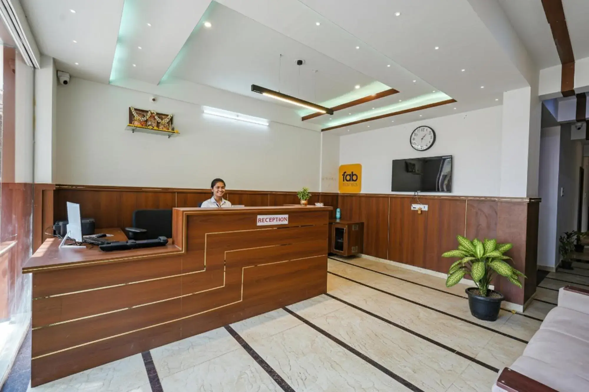Lobby or reception in FabHotel Tree Suites - Nr Reva University Lobby or reception in FabHotel Tree Suites - Nr Reva University