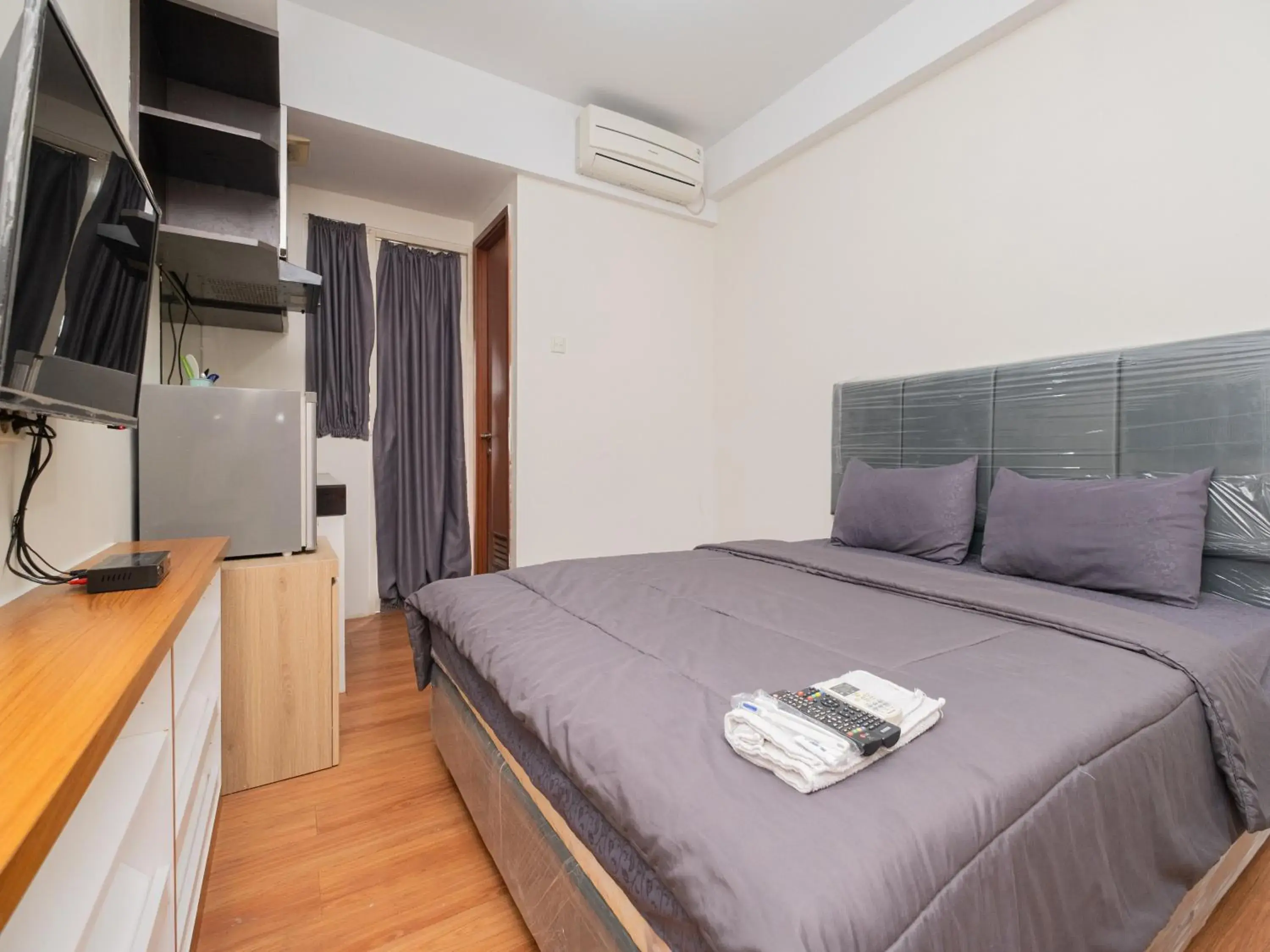 Bed in Apartemen Green Lake View Ciputat by Alfa Rooms Bed in Apartemen Green Lake View Ciputat by Alfa Rooms