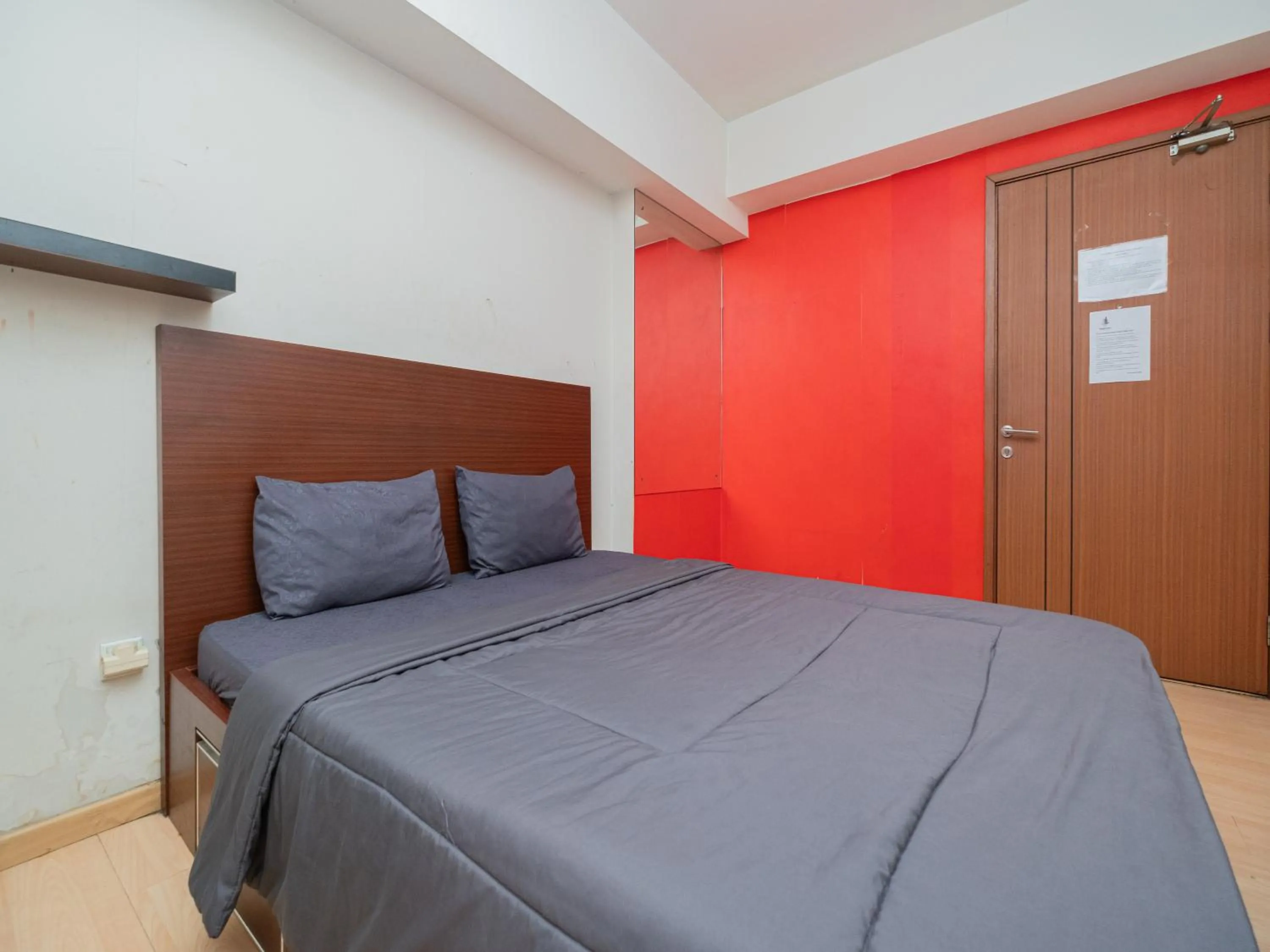 Bed in Apartemen Green Lake View Ciputat by Alfa Rooms