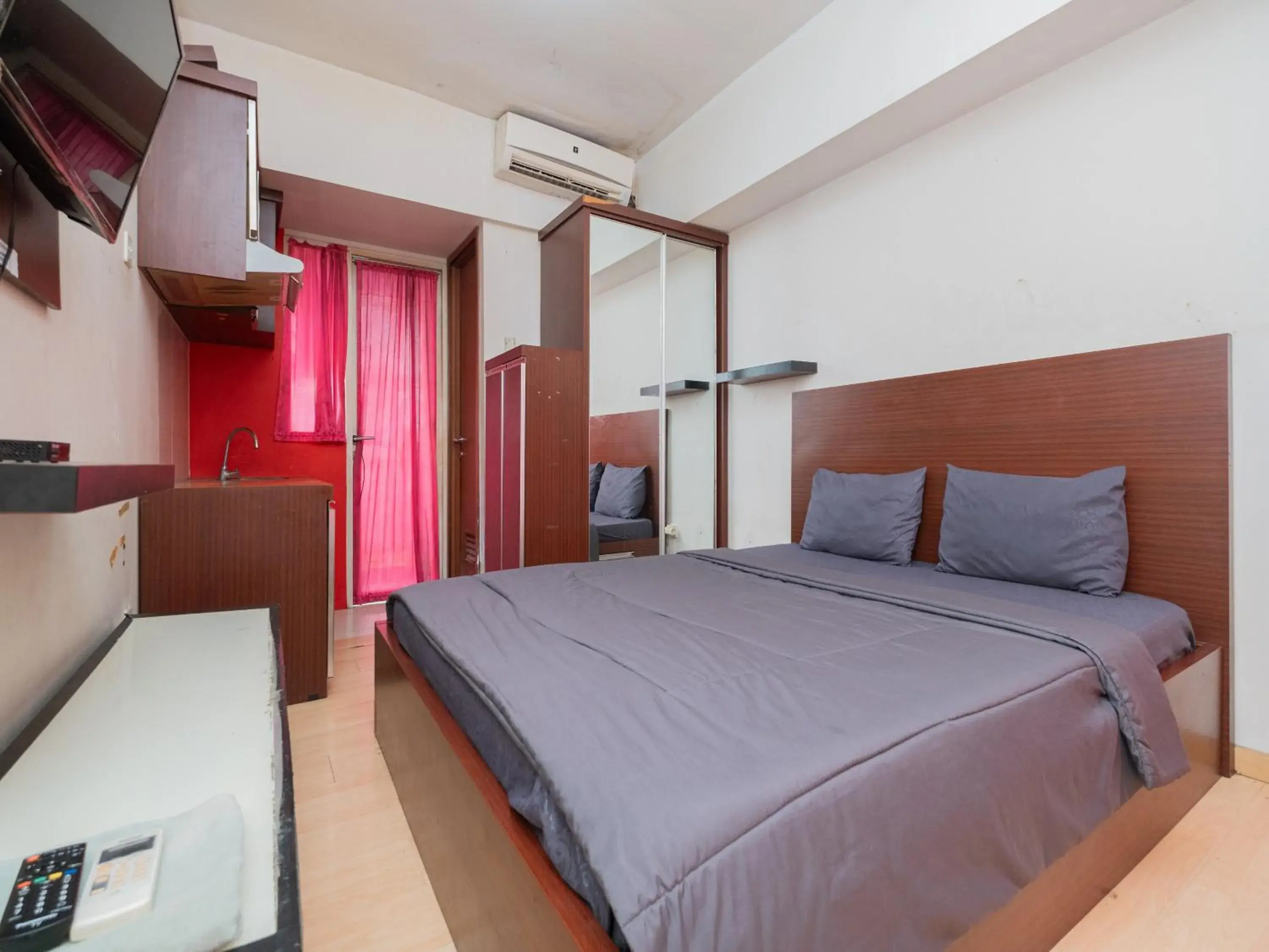 Bed in Apartemen Green Lake View Ciputat by Alfa Rooms Bed in Apartemen Green Lake View Ciputat by Alfa Rooms