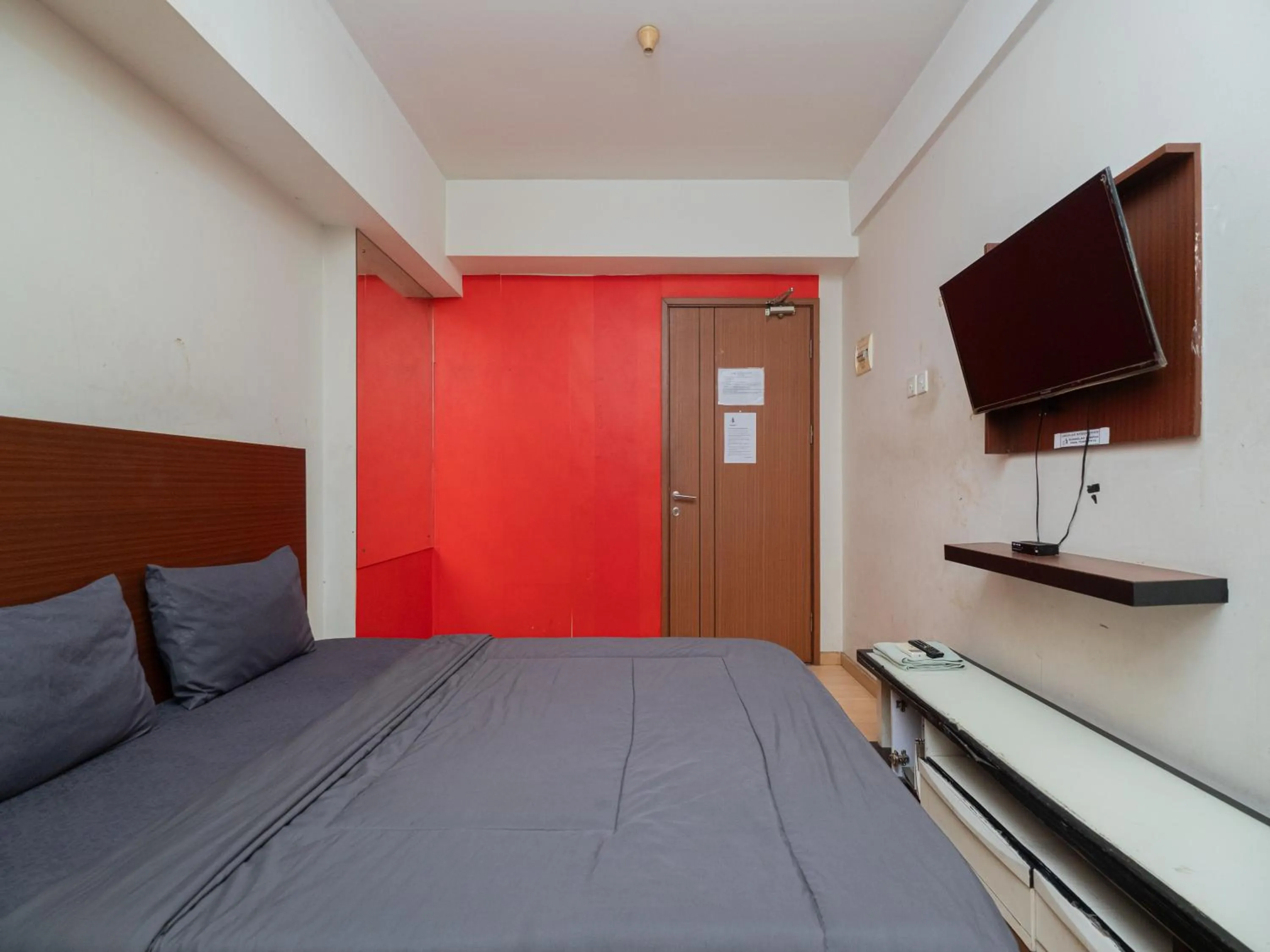 Bed in Apartemen Green Lake View Ciputat by Alfa Rooms