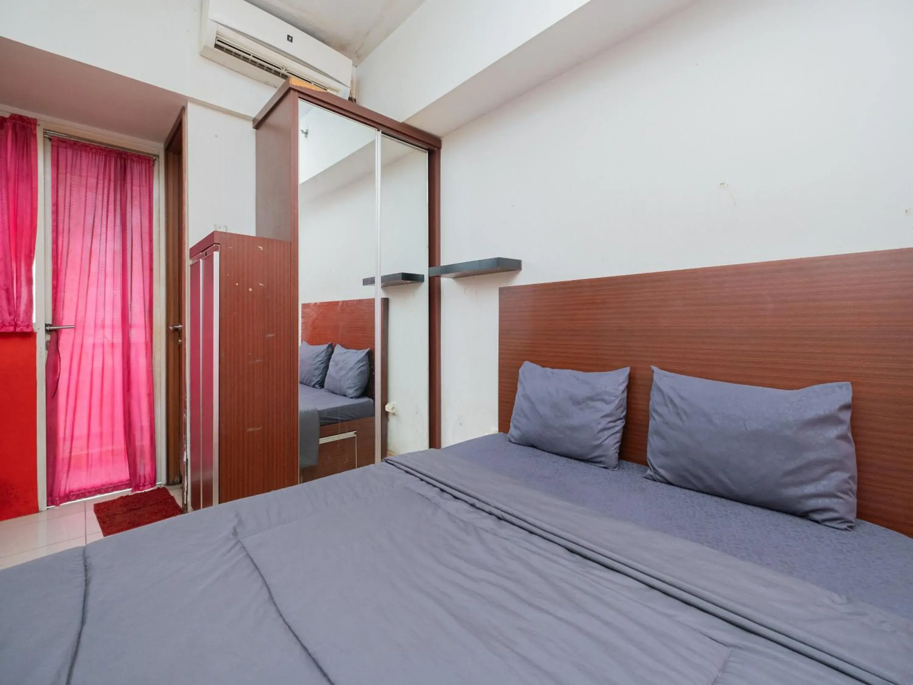 Bed in Apartemen Green Lake View Ciputat by Alfa Rooms Bed in Apartemen Green Lake View Ciputat by Alfa Rooms