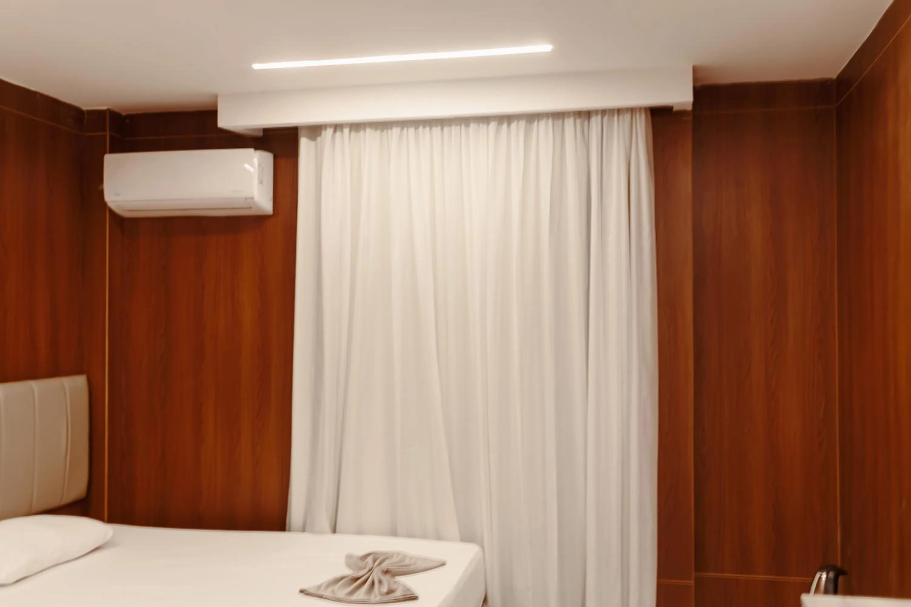 air conditioner, Bed in Royal Home Hotel