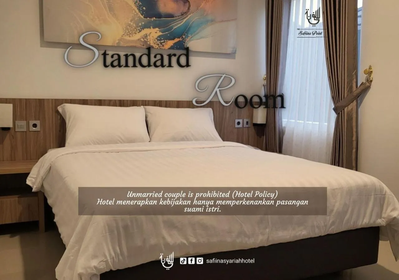 Bed in The Safiina Point Syariah Hotel