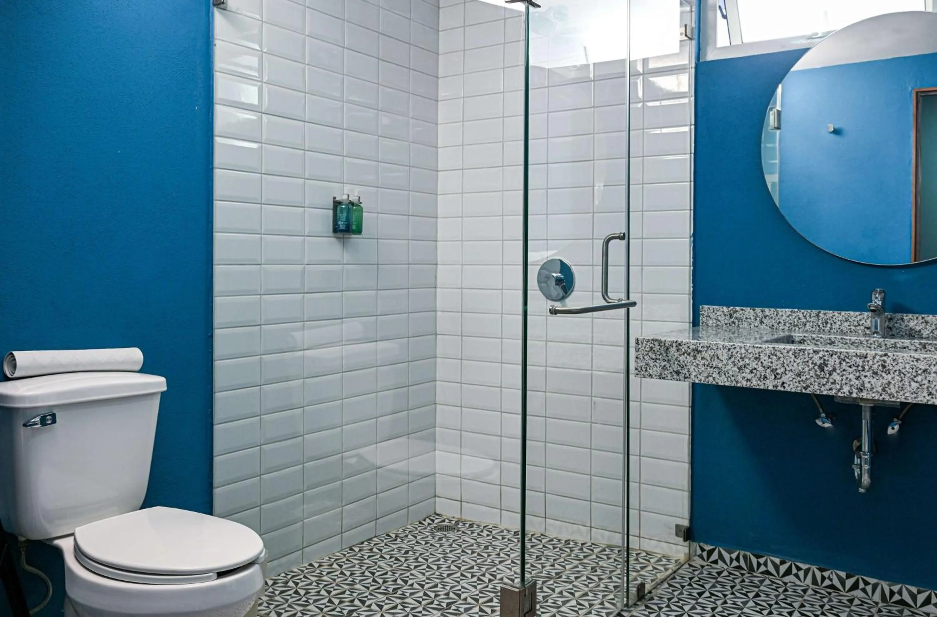 Bathroom in Vista Express Guadalajara Expo SureStay Collection by BW