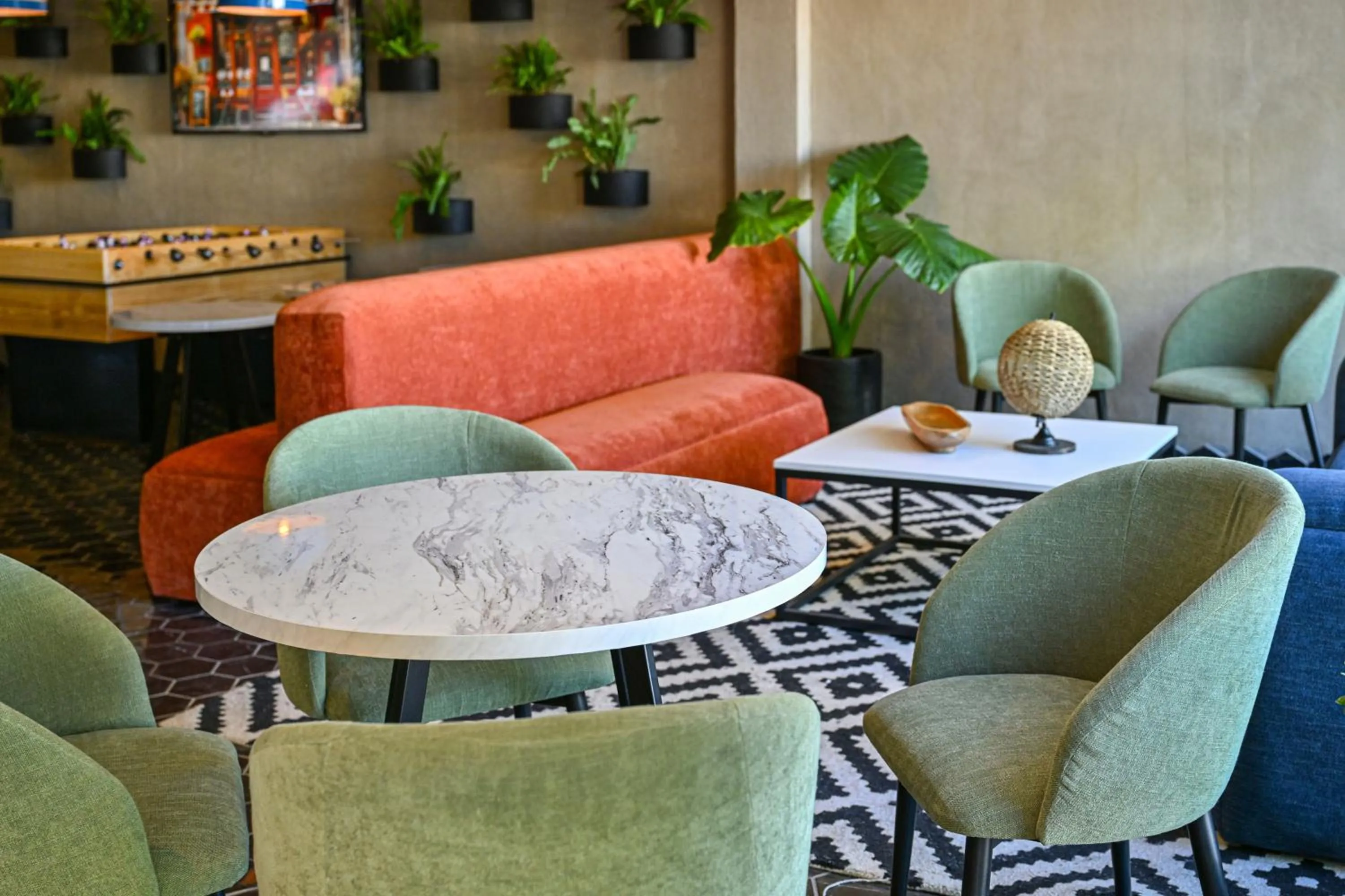 Seating area in Vista Express Guadalajara Expo SureStay Collection by BW