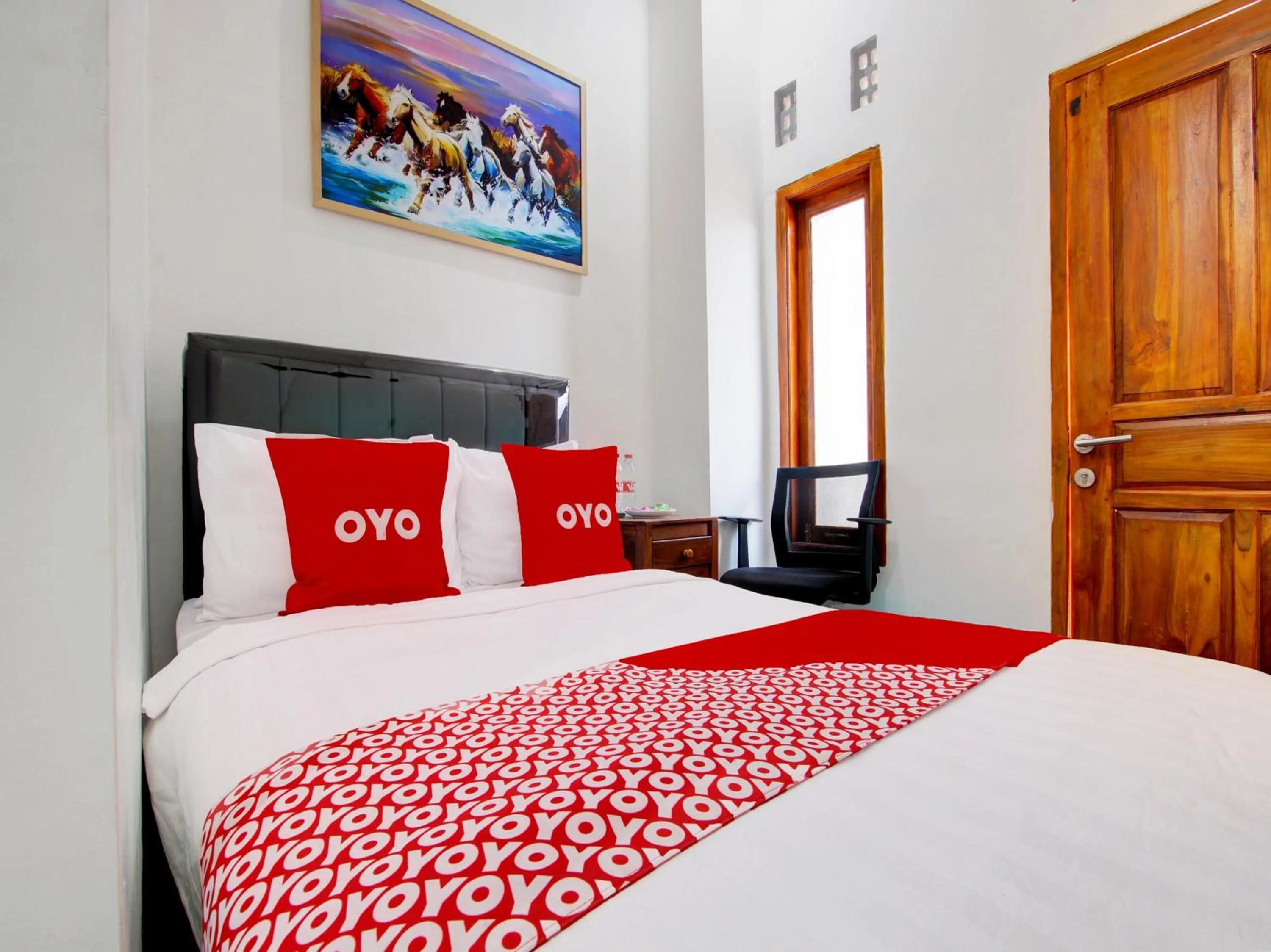 Bedroom in OYO 93188 Soren Hotel And Coffee