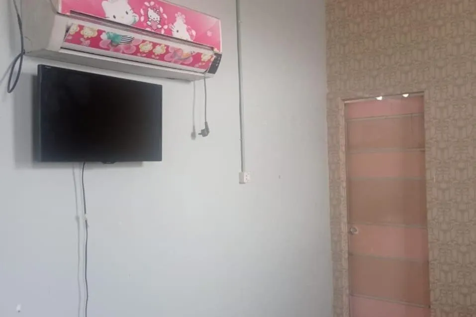 Bedroom in Hotel O Andesta Guest House SyariahNearAgrowisata Sungai Pinang Agro Nadin