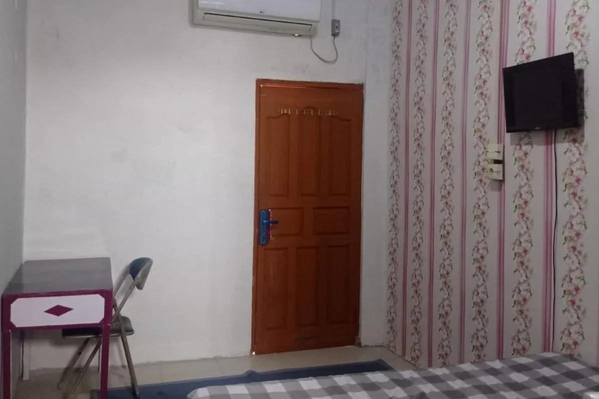 Bedroom in Hotel O Andesta Guest House SyariahNearAgrowisata Sungai Pinang Agro Nadin