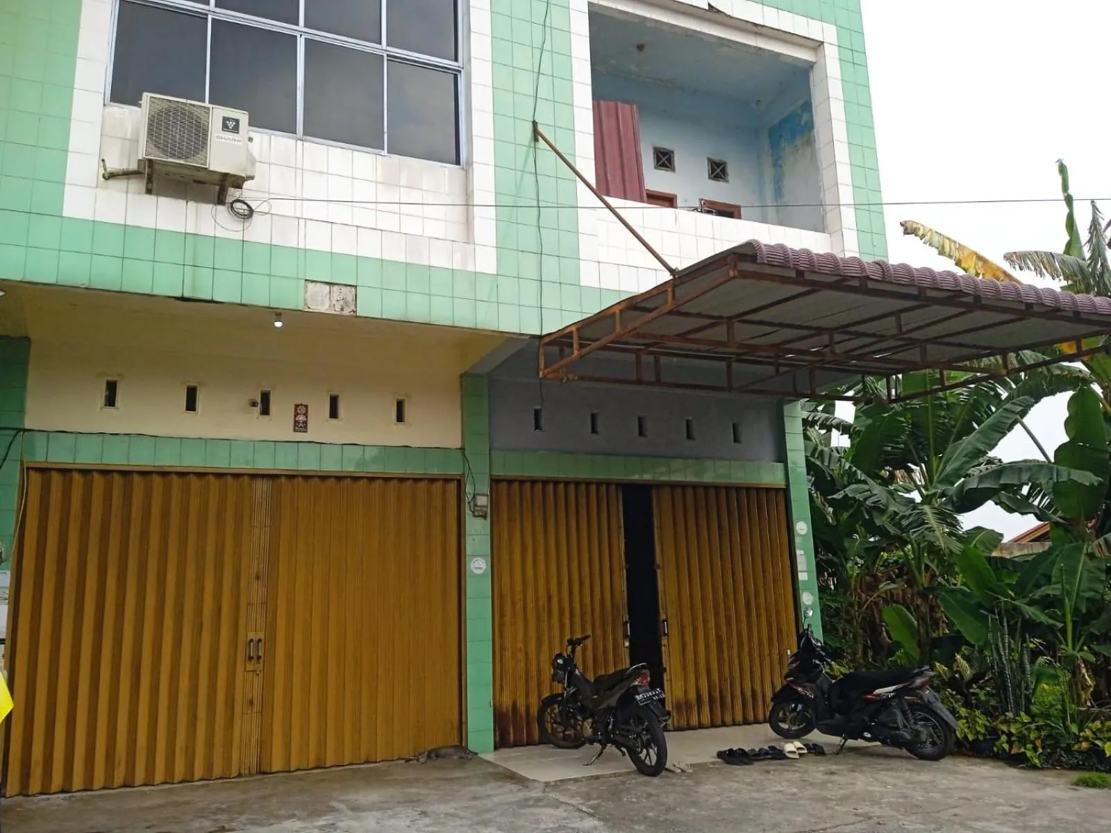 Facade/entrance in Hotel O Andesta Guest House SyariahNearAgrowisata Sungai Pinang Agro Nadin