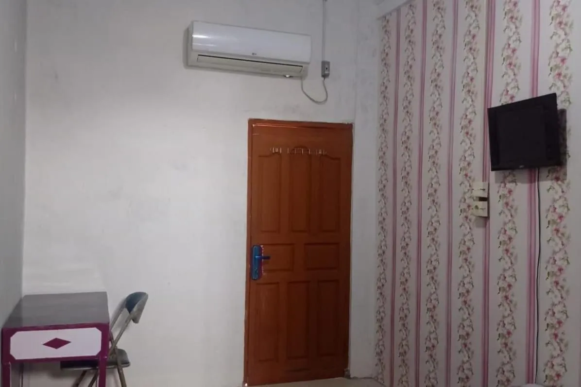 Bedroom in Hotel O Andesta Guest House SyariahNearAgrowisata Sungai Pinang Agro Nadin