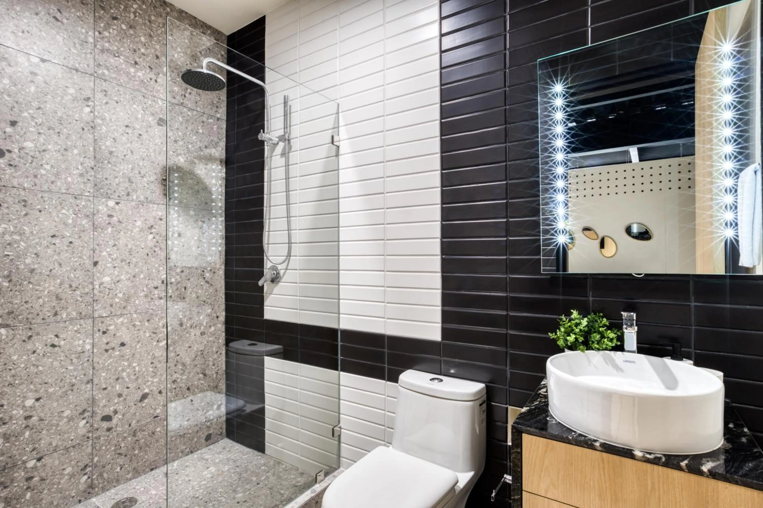 Shower in Downtown Designer Apartments by ULIV