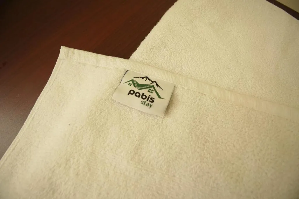 Property logo or sign in Pabis luxurious stay