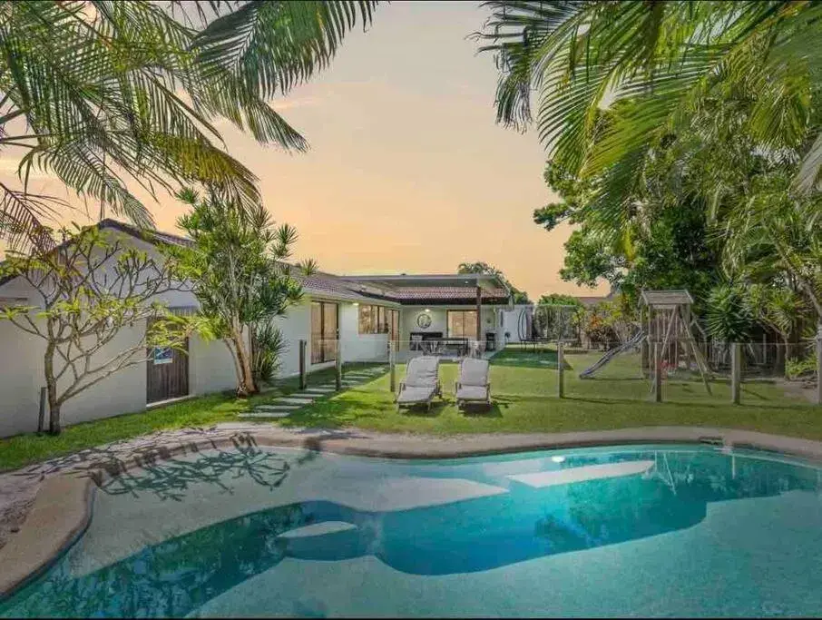 Modern Beach home with large private gardens Modern Beach home with large private gardens