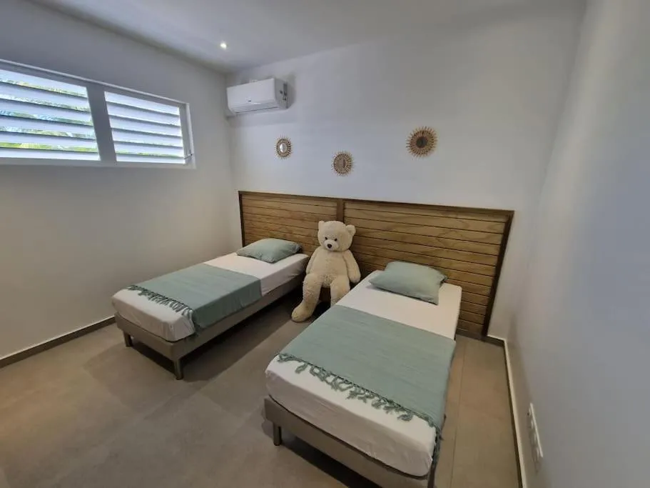 Bed in Villa K'araïbes - Saint François - Jusqu'à 6 personnes et 1 bébé