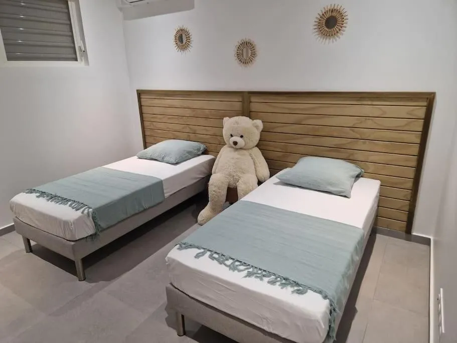 Bed in Villa K'araïbes - Saint François - Jusqu'à 6 personnes et 1 bébé