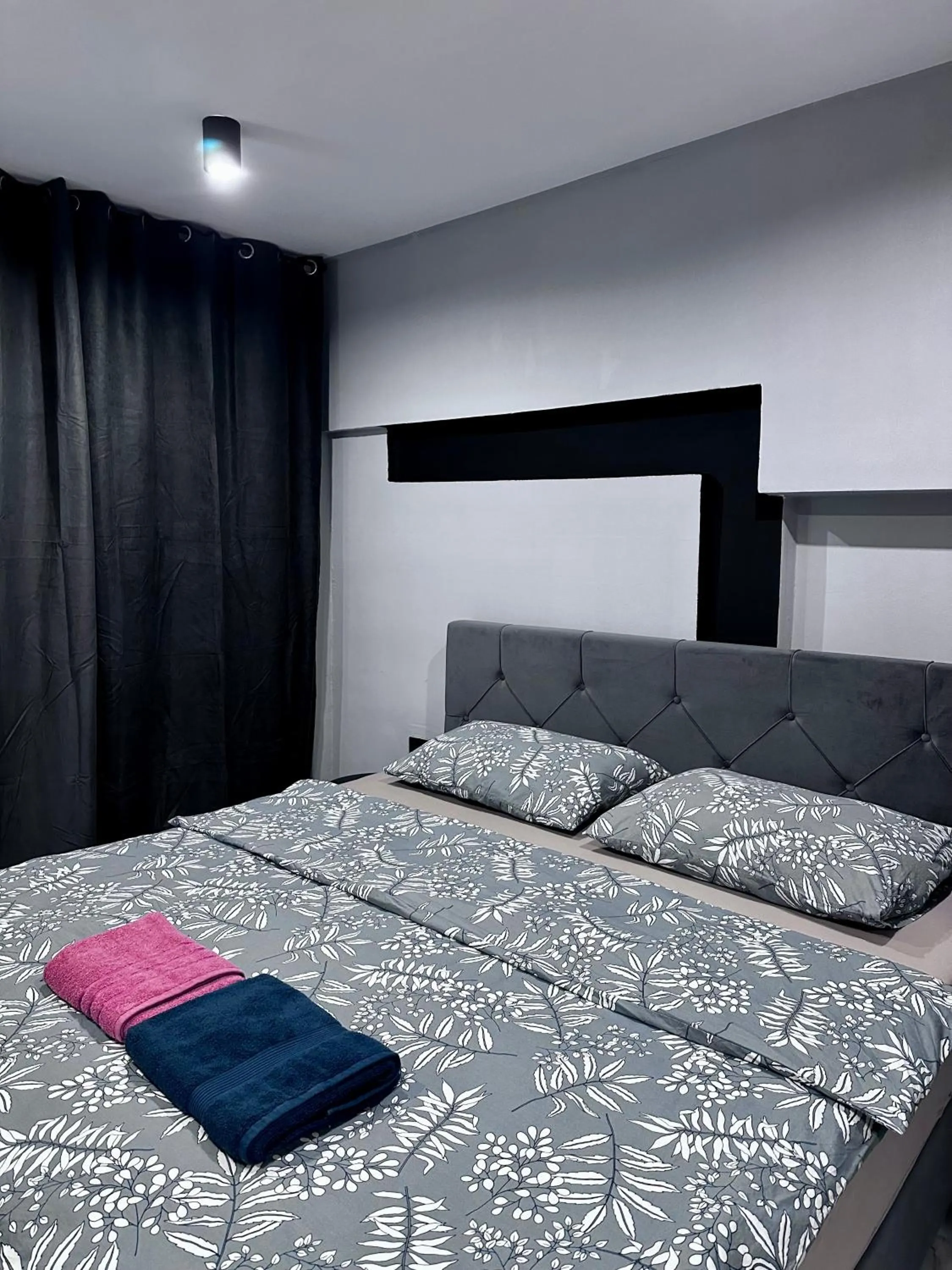 Bed in Allegra Rooms