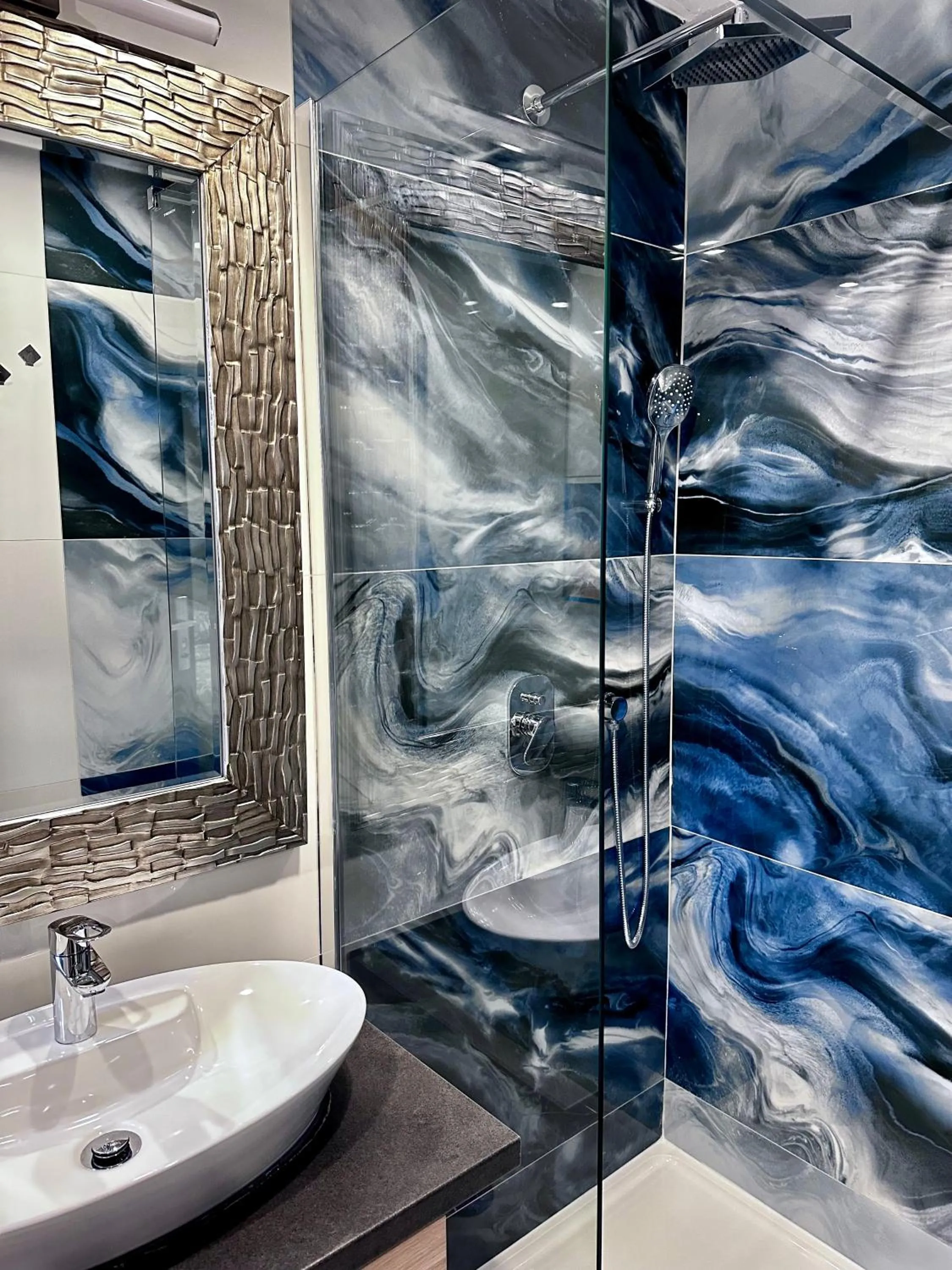 Shower in Allegra Rooms