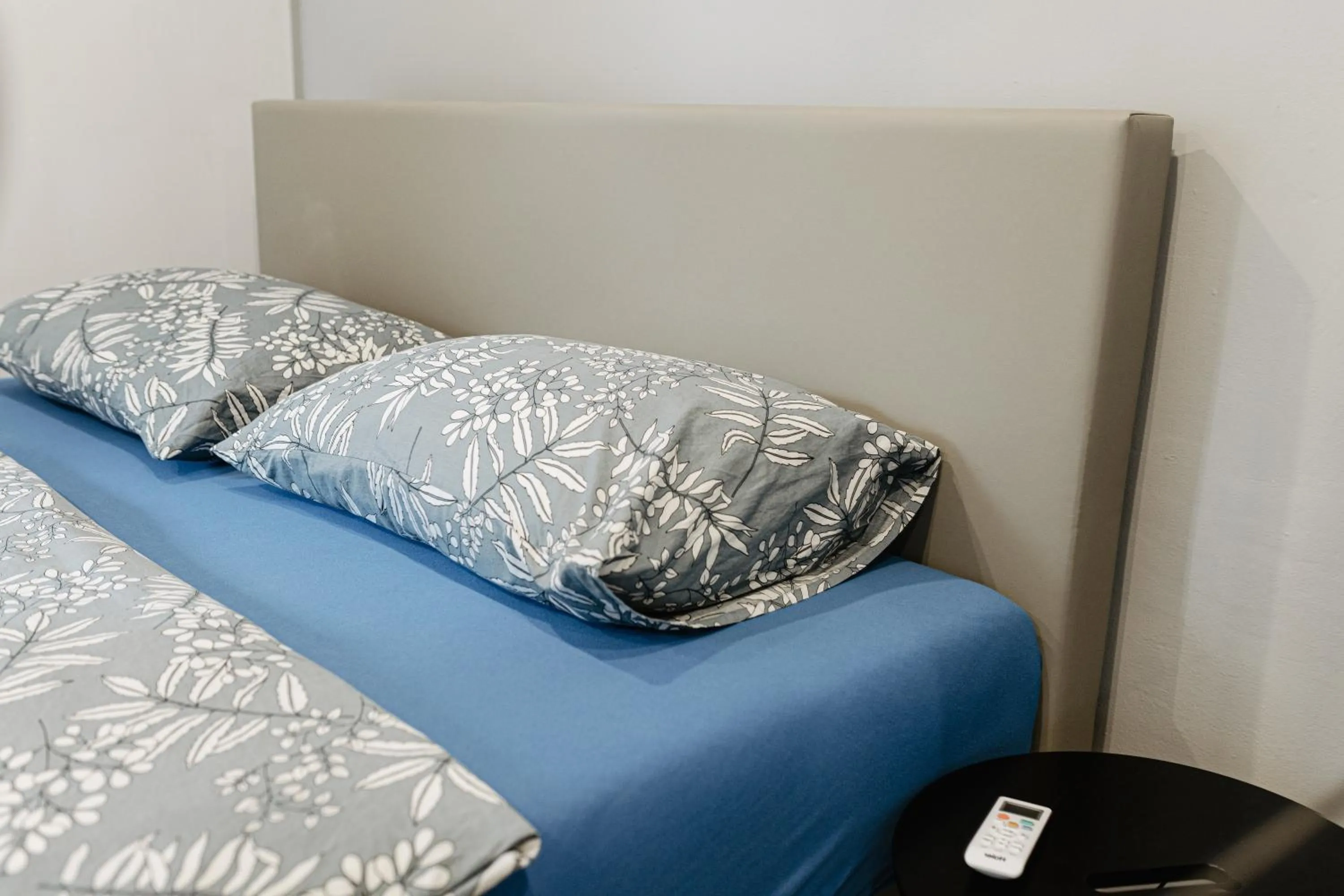 Bed in Allegra Rooms