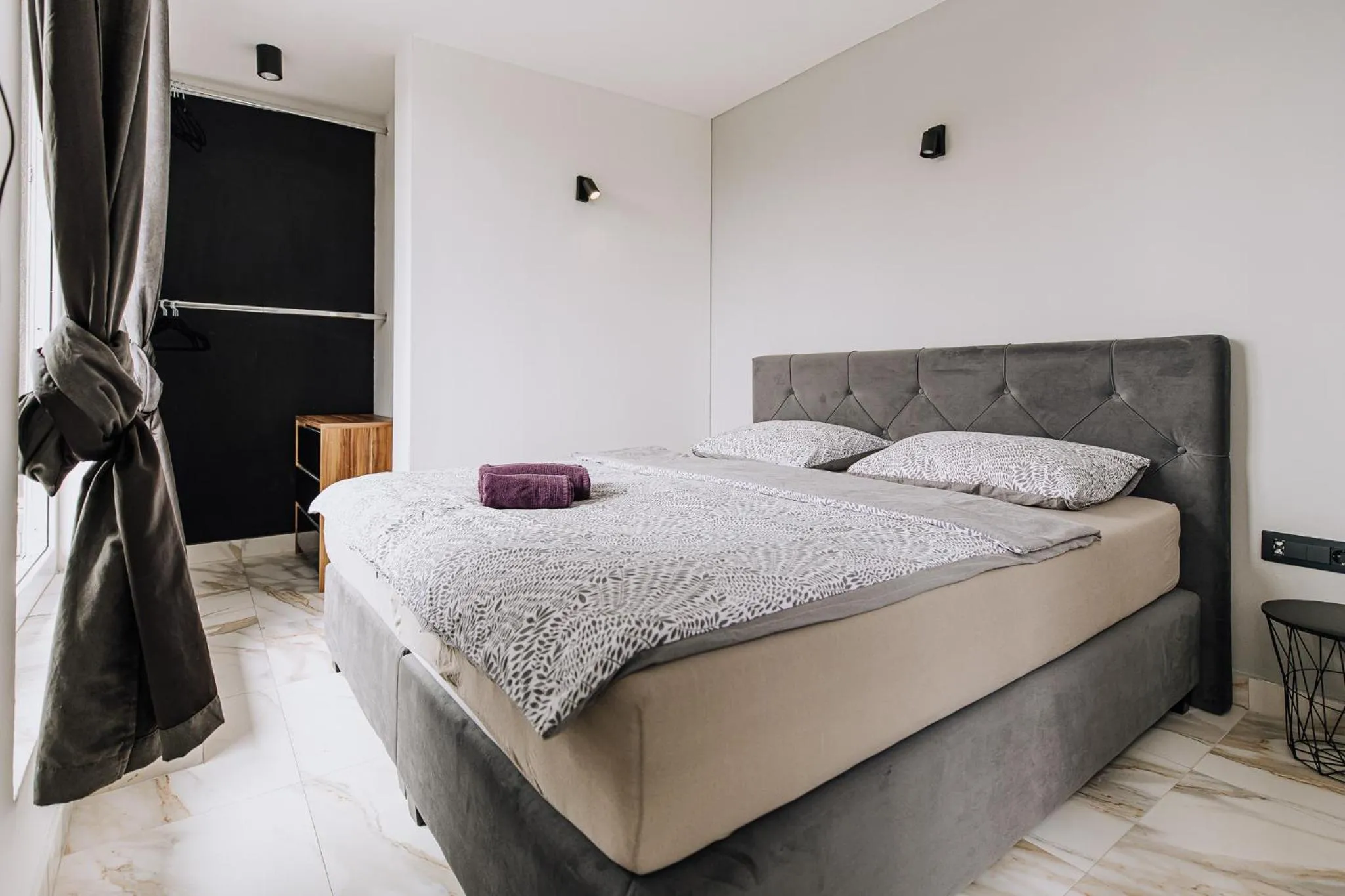 Bed in Allegra Rooms