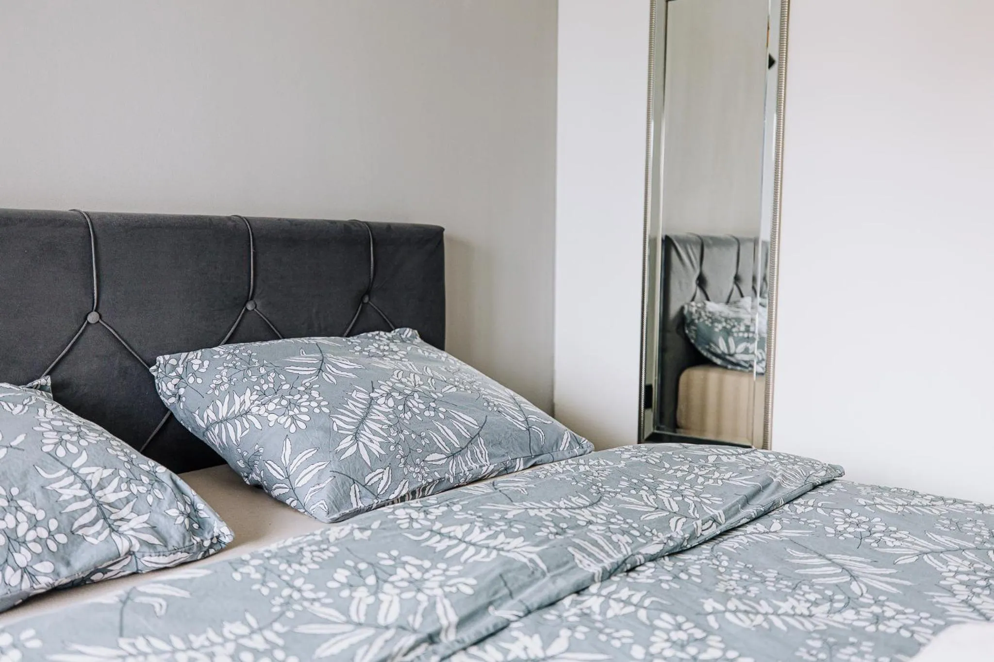 Bed in Allegra Rooms