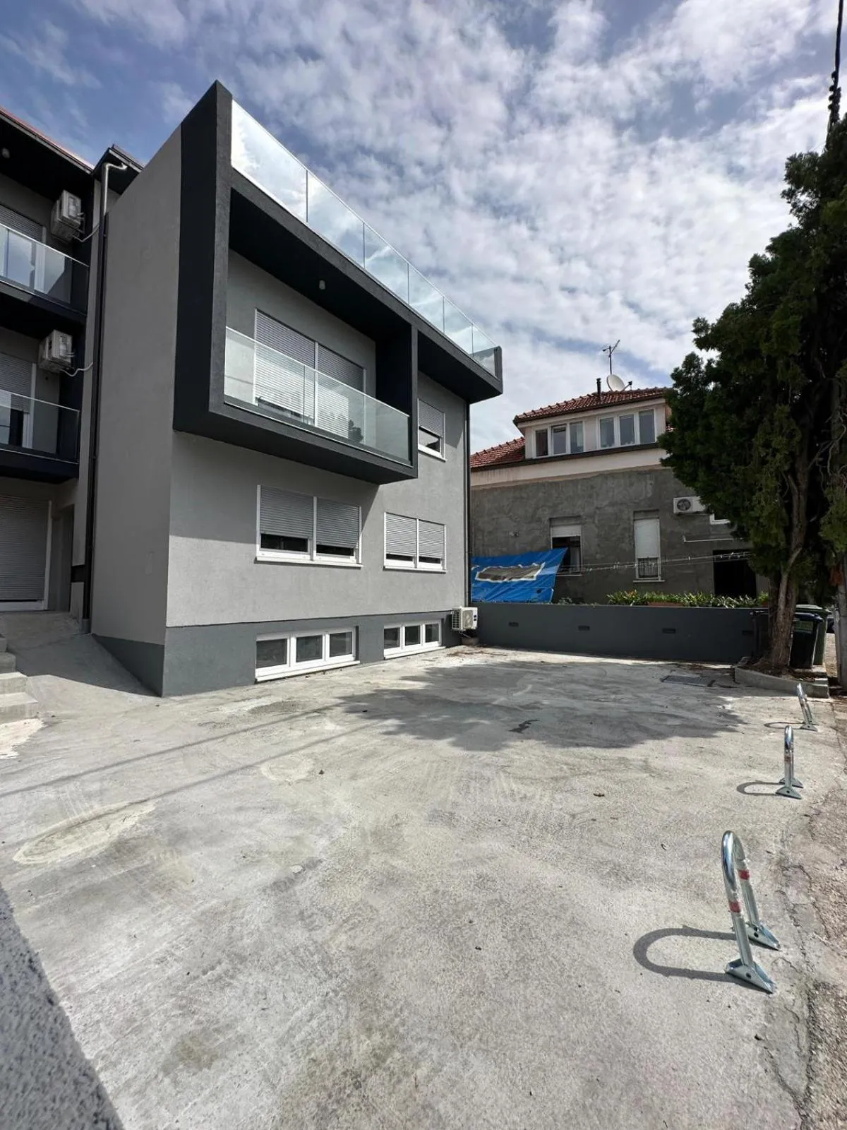 Property building in Allegra Rooms