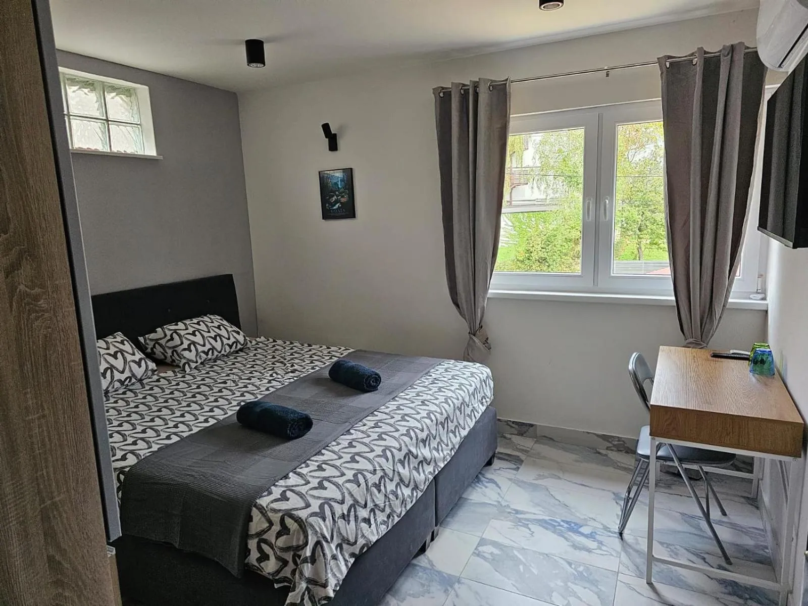 Bed in Allegra Rooms