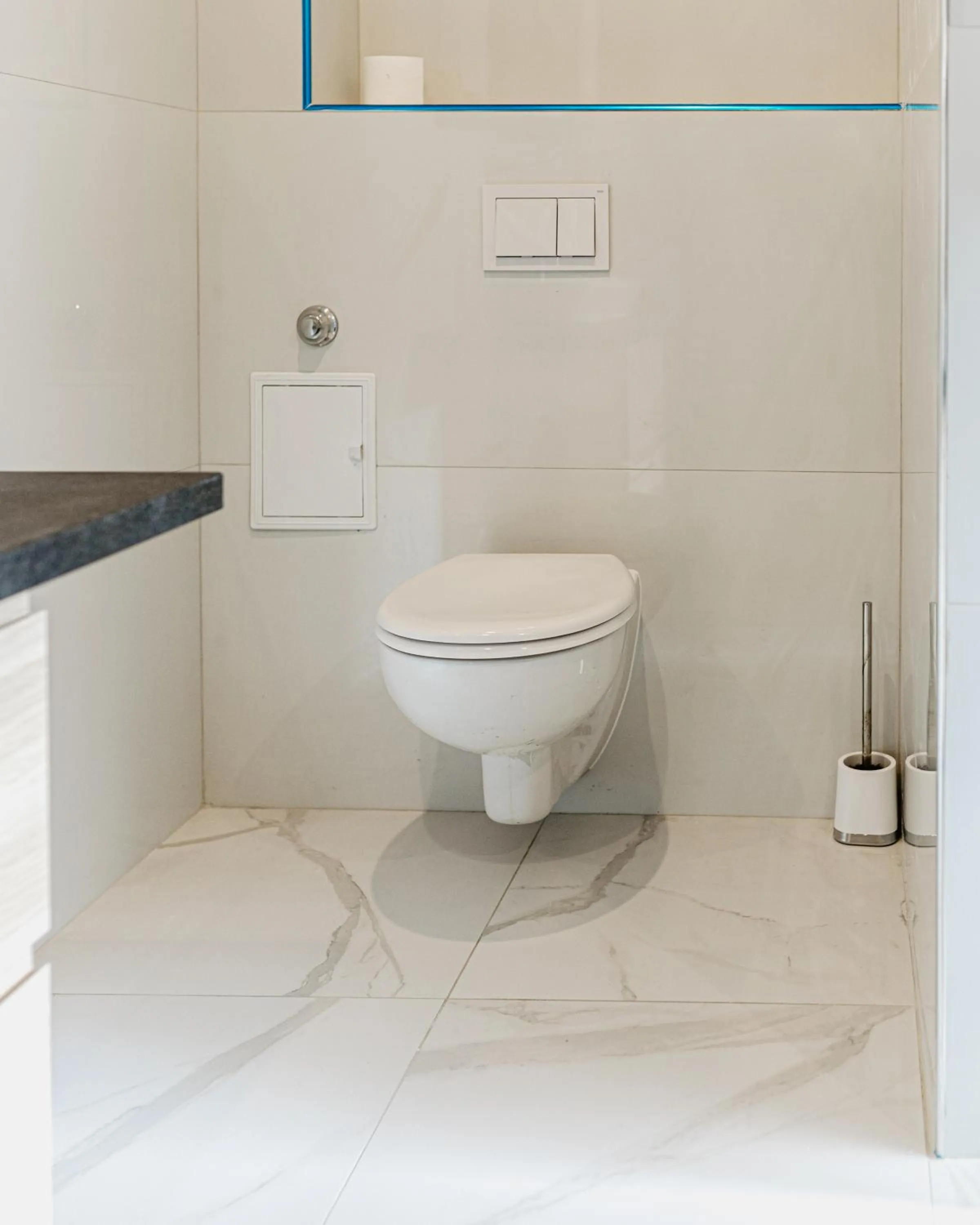Toilet in Allegra Rooms