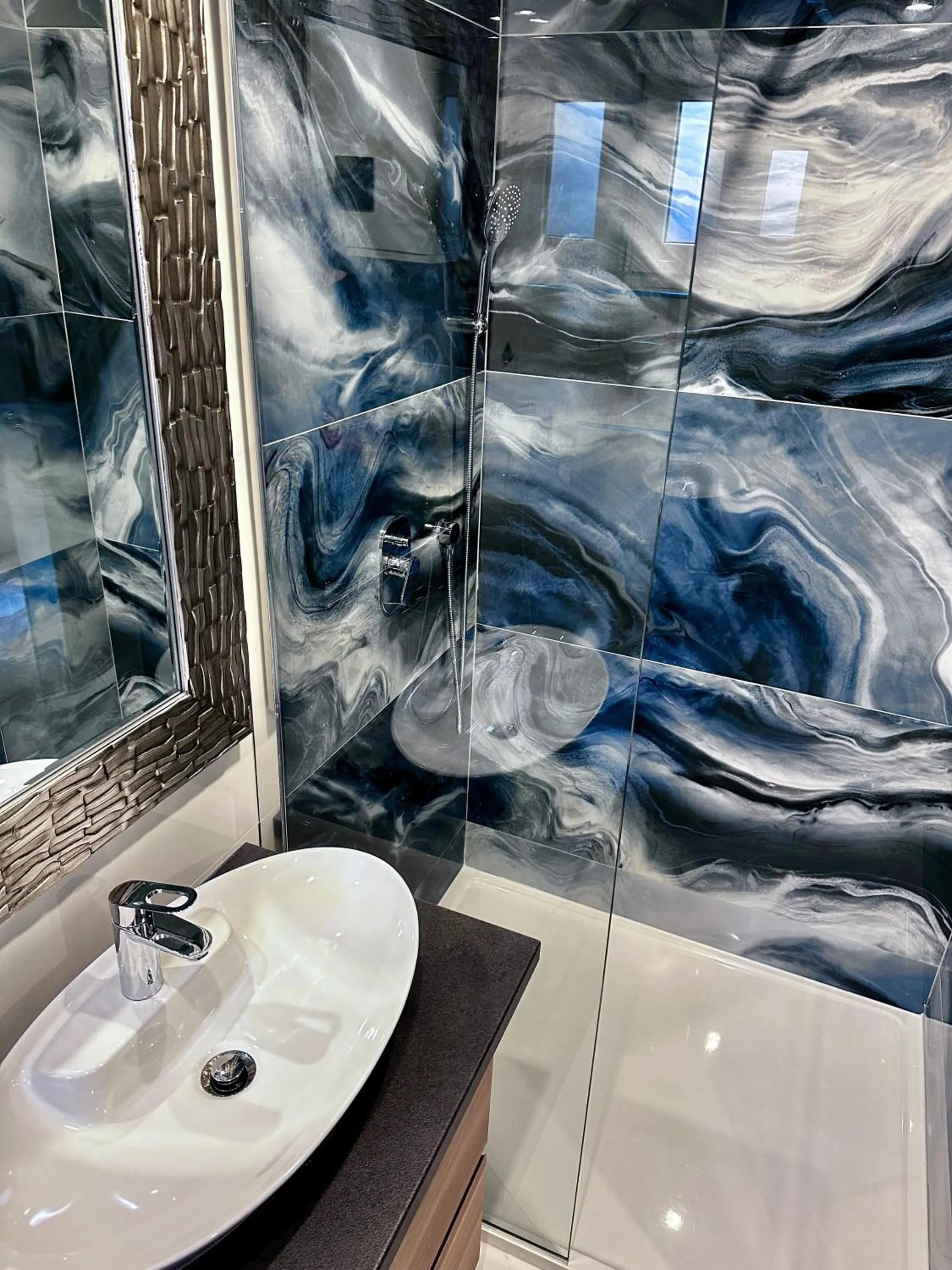 Shower in Allegra Rooms